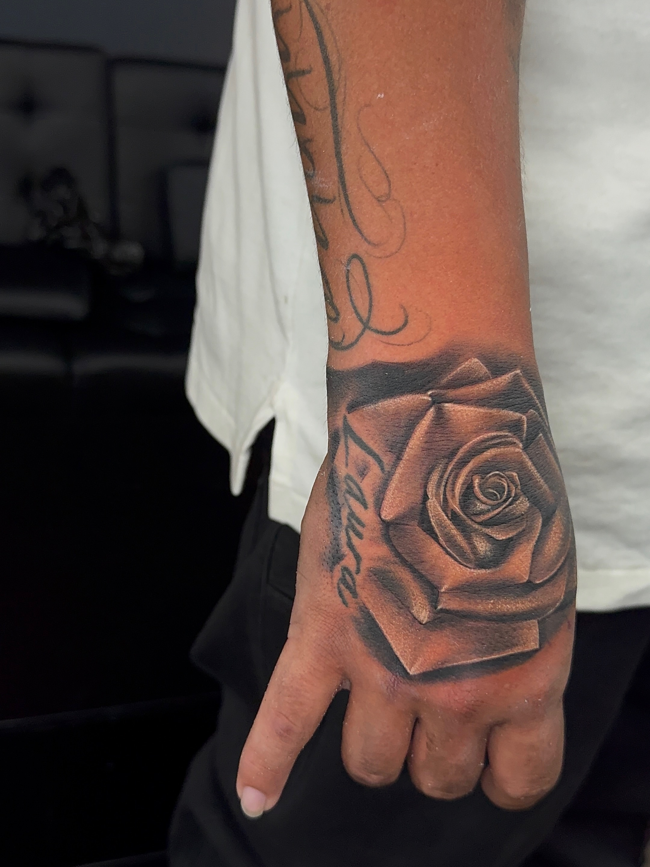 Rose realism tattoo on the hand by Dallas tattoo artist, Dallas, Texas