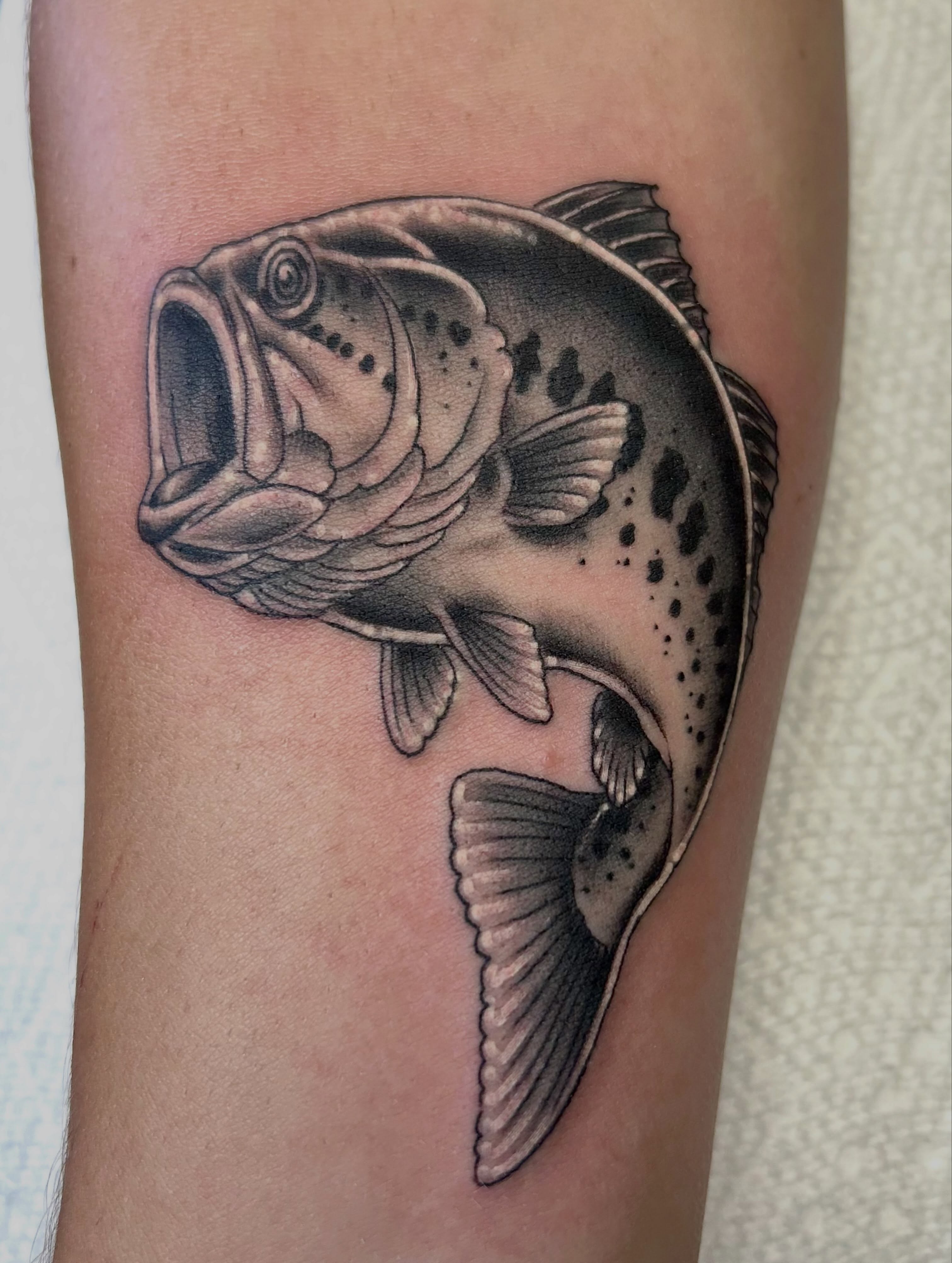 Fish realism tattoo on the forearm by darklord_666