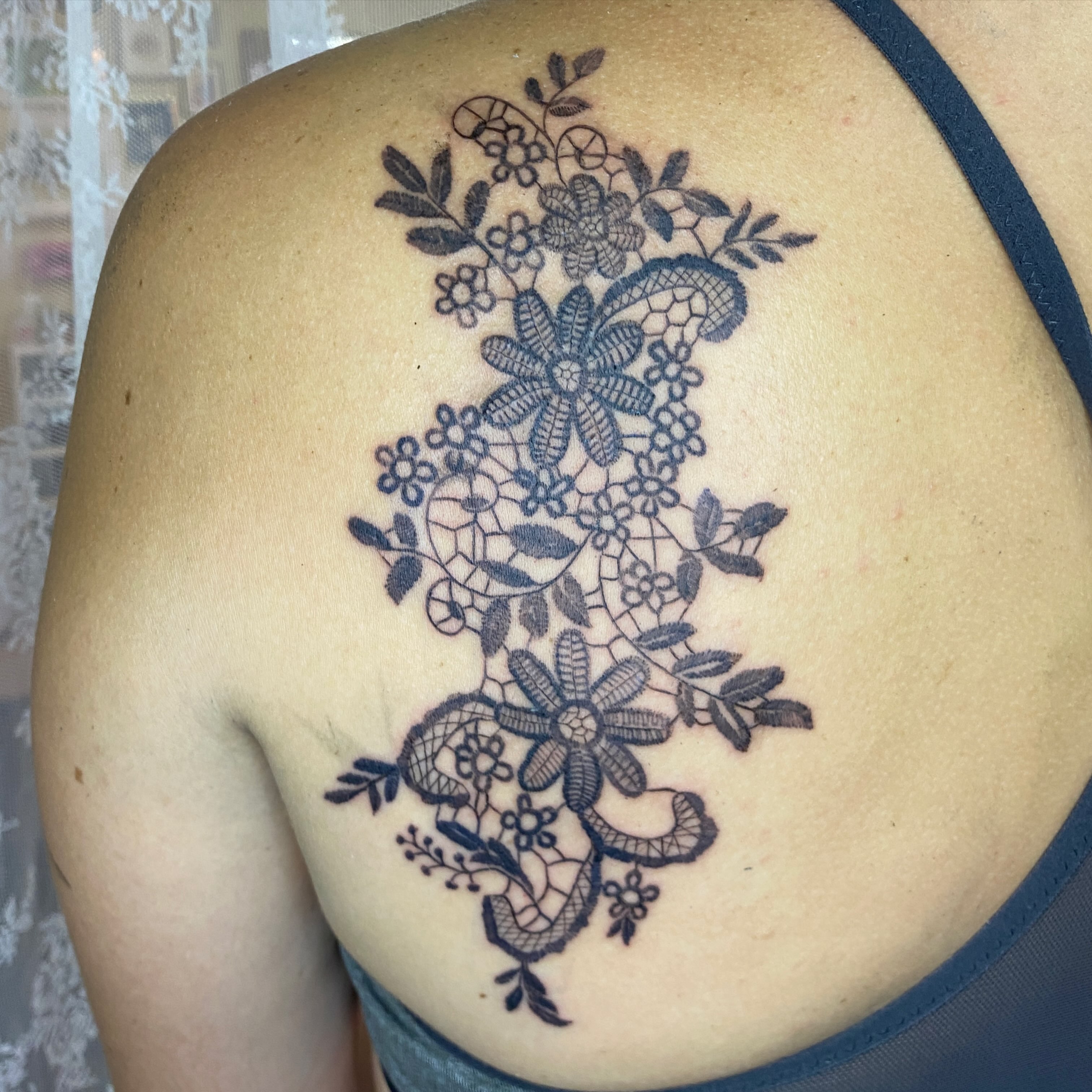 Floral bouquet geometric tattoo on the back by °₊⊹ delia ✩ jane ೃ࿔*