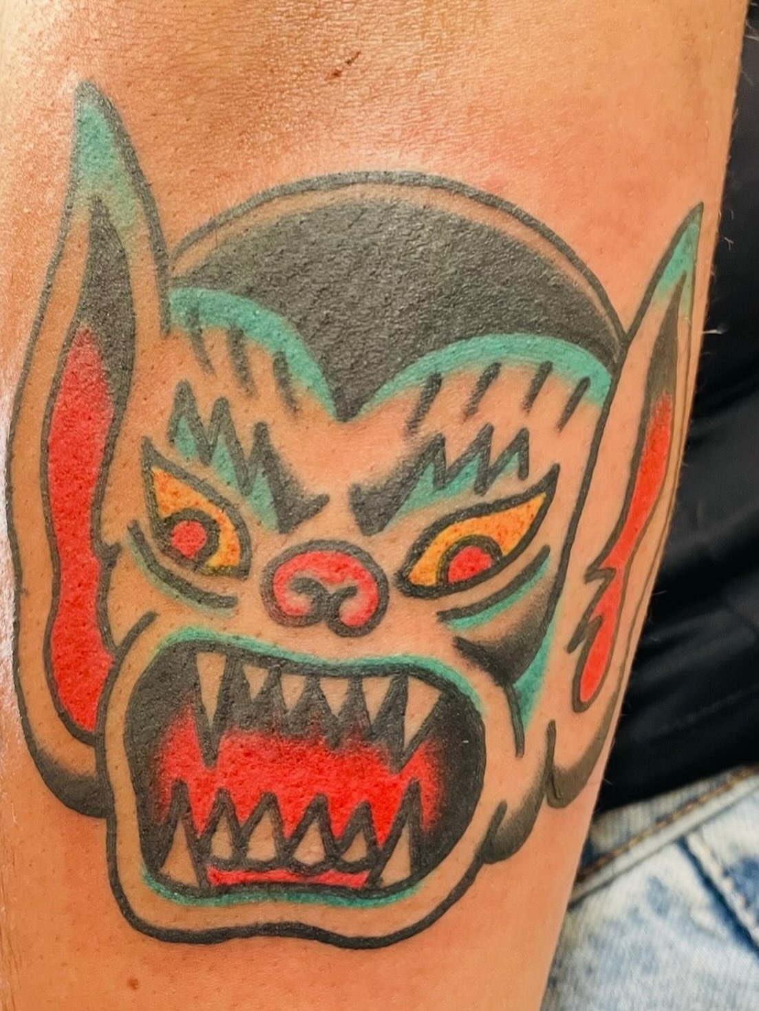 Demon face American traditional tattoo on the forearm by dave rash