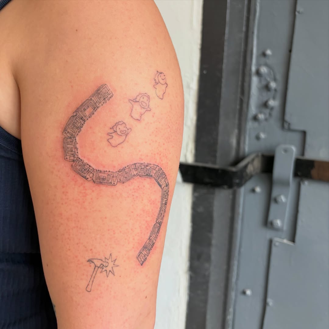 Cityscape geometric tattoo on the upper arm by annie’s tattoos ⭐꩜ .ᐟ