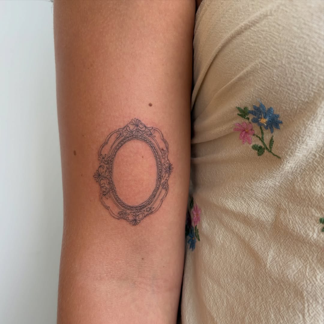 Oval frame ornamental tattoo on the forearm by annie’s tattoos ⭐꩜ .ᐟ