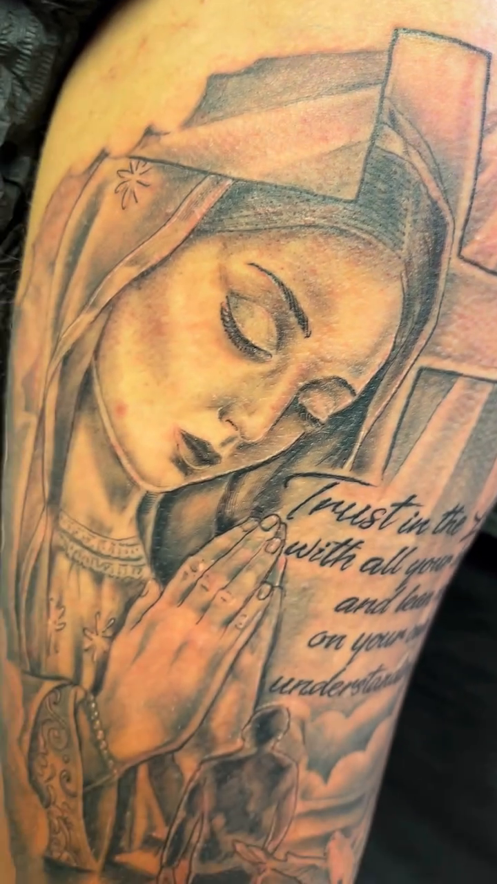 Virgin Mary and cross realism tattoo by Jakobi