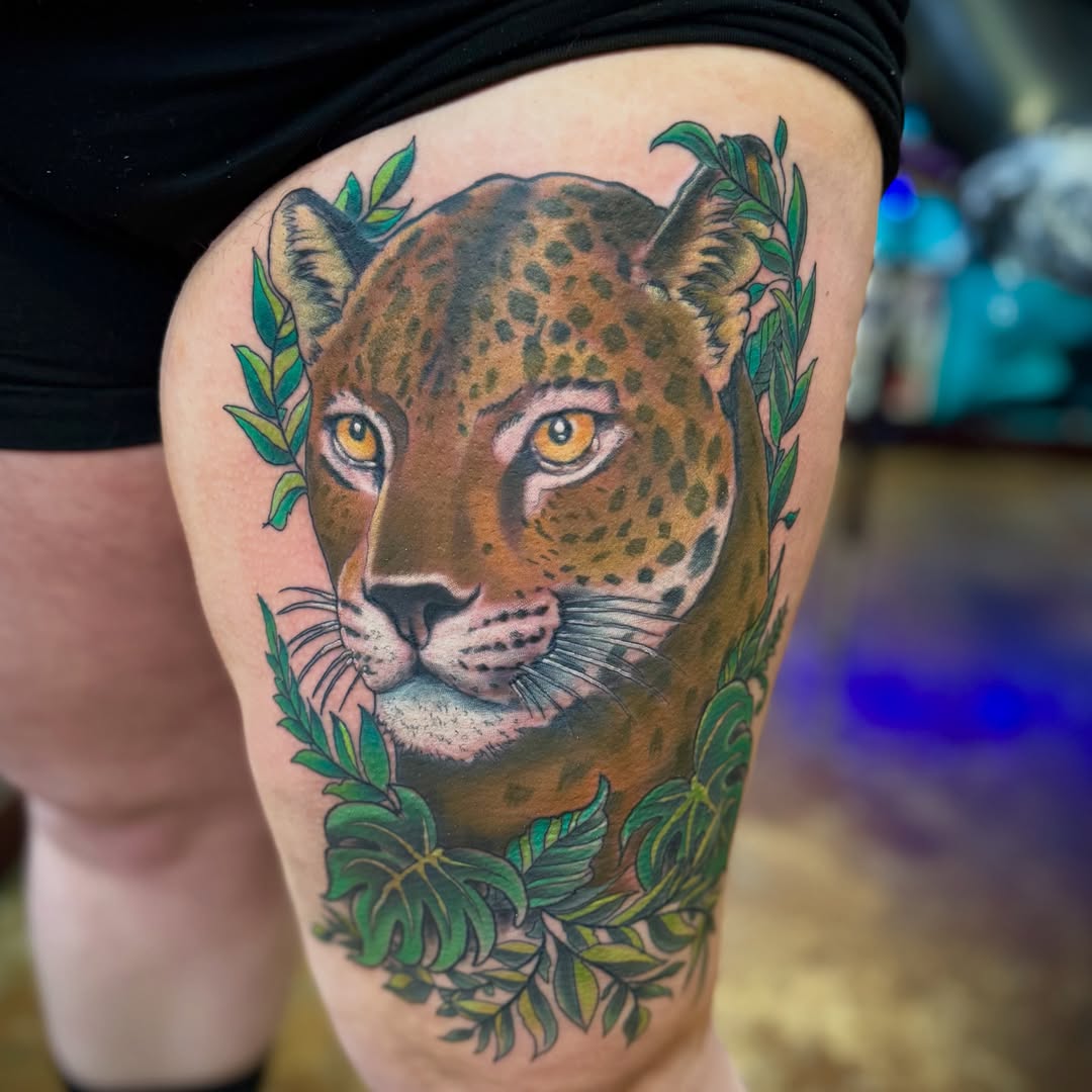 Jaguar realism tattoo on the thigh by David C. McGhee