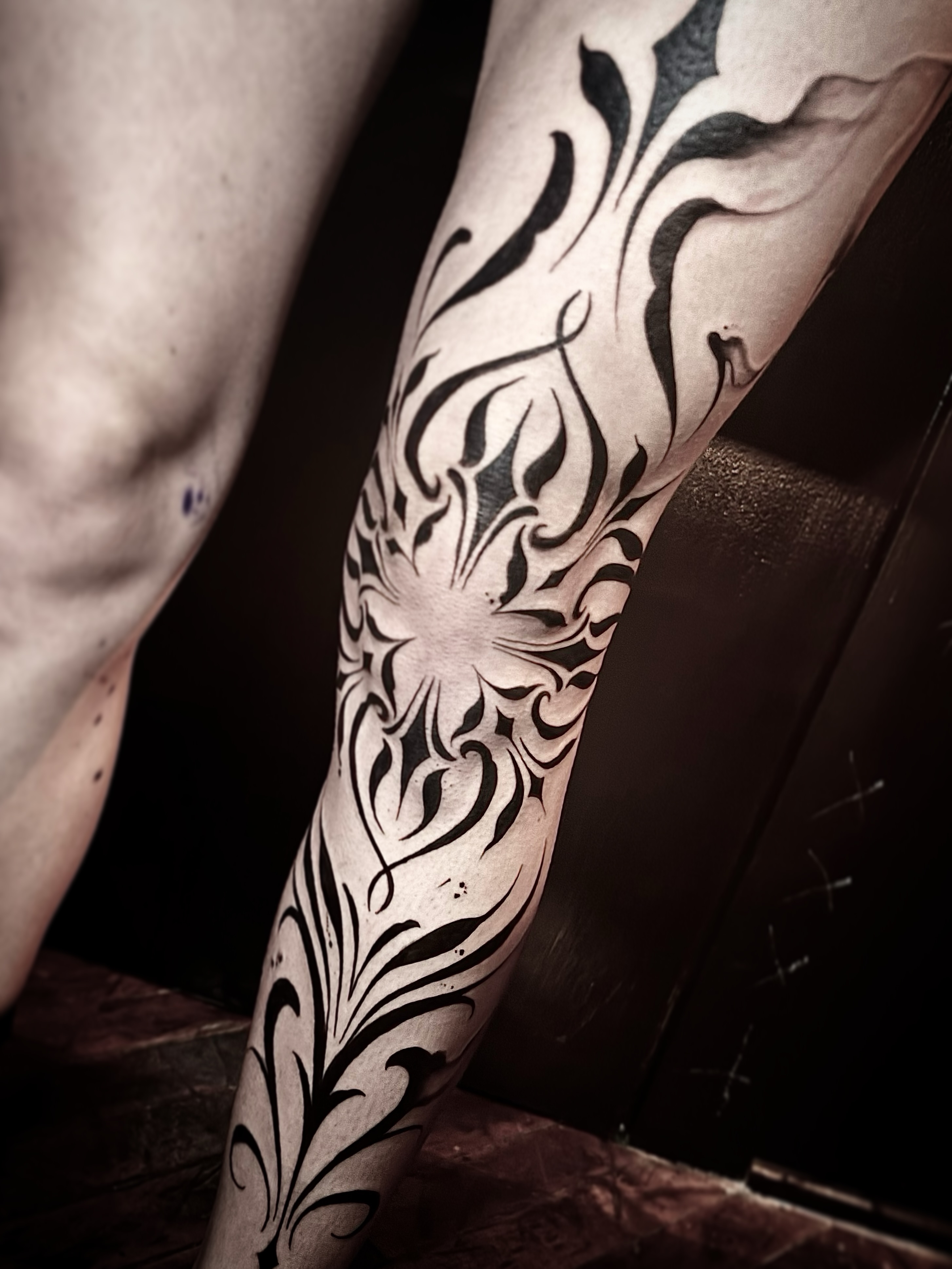 Floral pattern tribal tattoo on the forearm by Cassandra Colleen