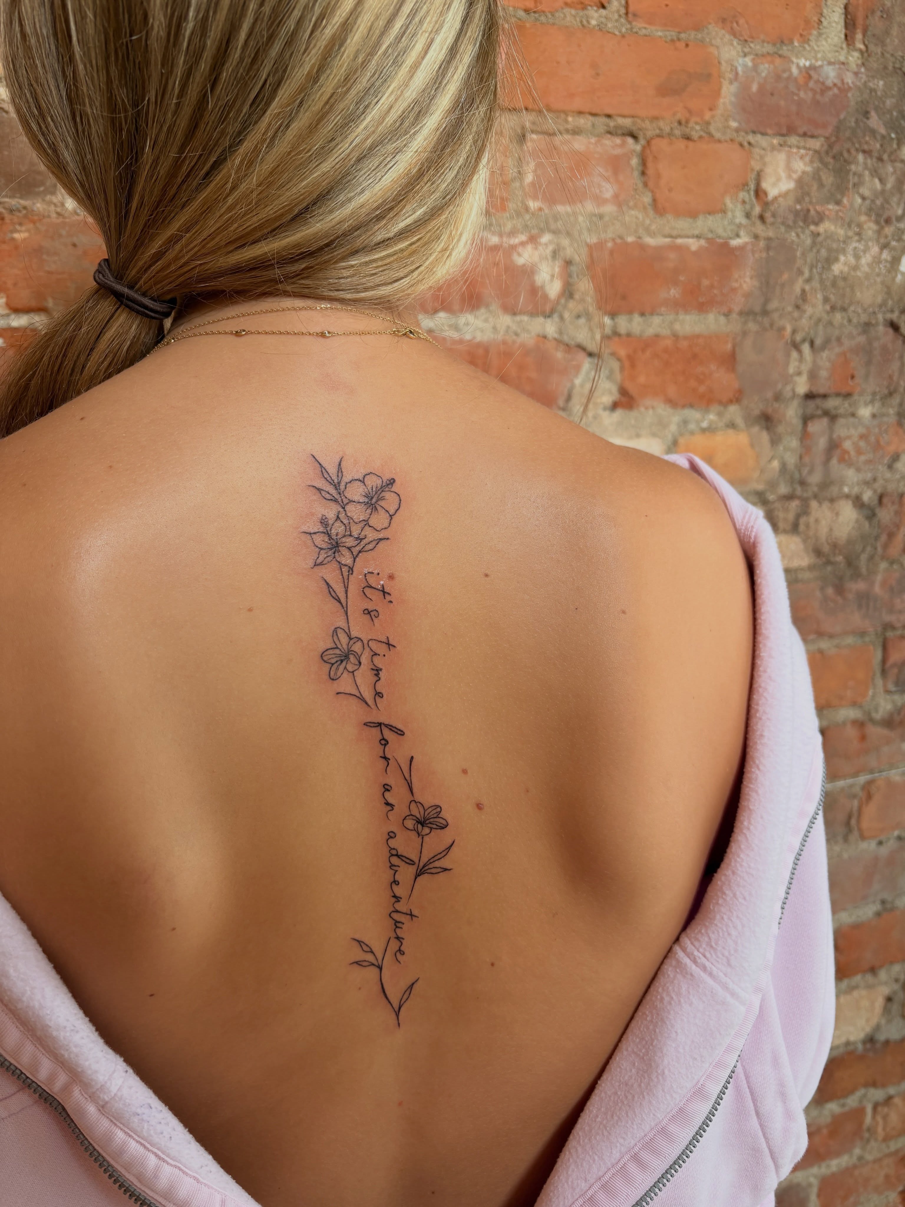 Flowers and script fine line tattoo on the back by Jen Osborne ♡ Cincinnati Tattoo Artist
