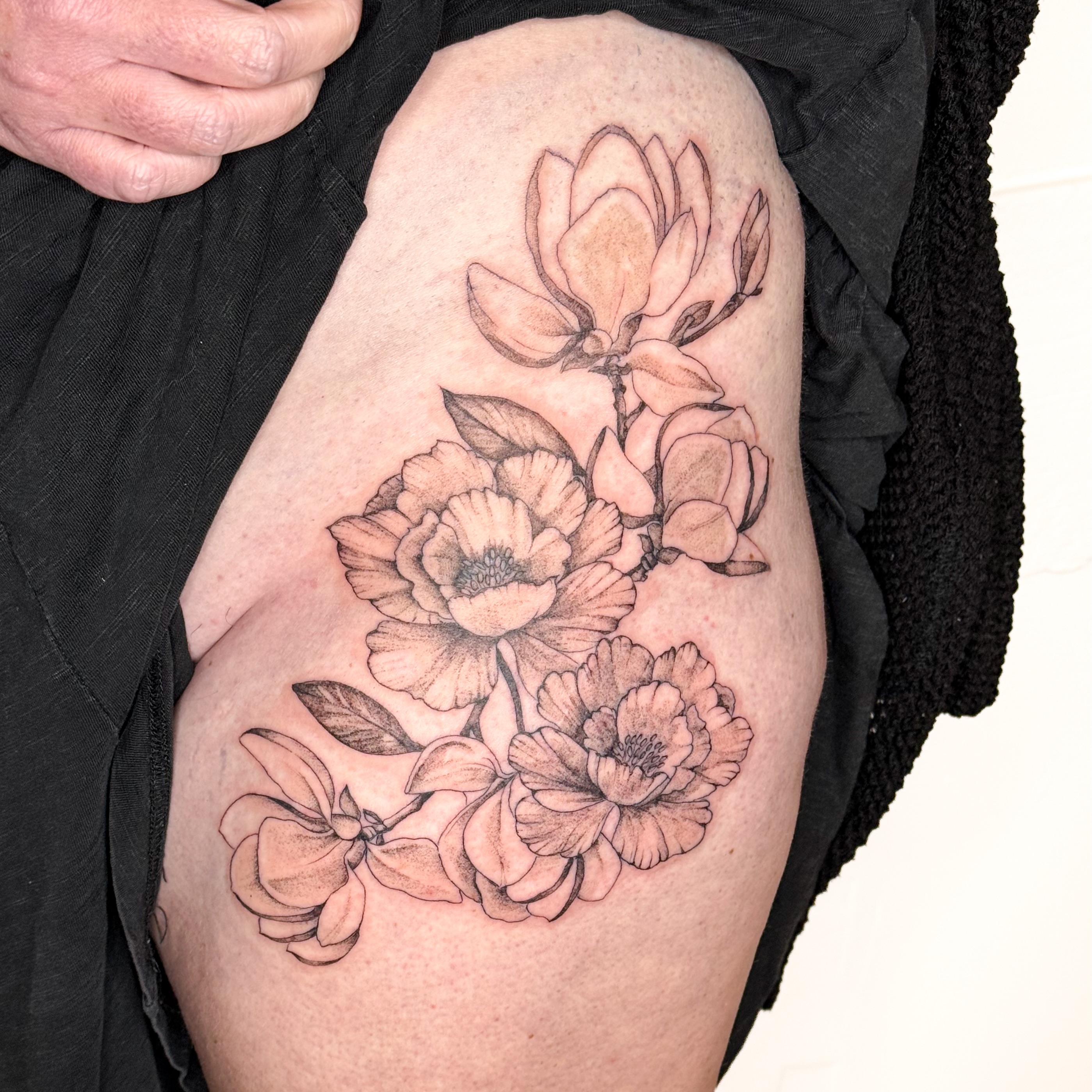 Flowers black and grey tattoo on the thigh by ❁ Marlo Marquise Tattoo Artist ❁