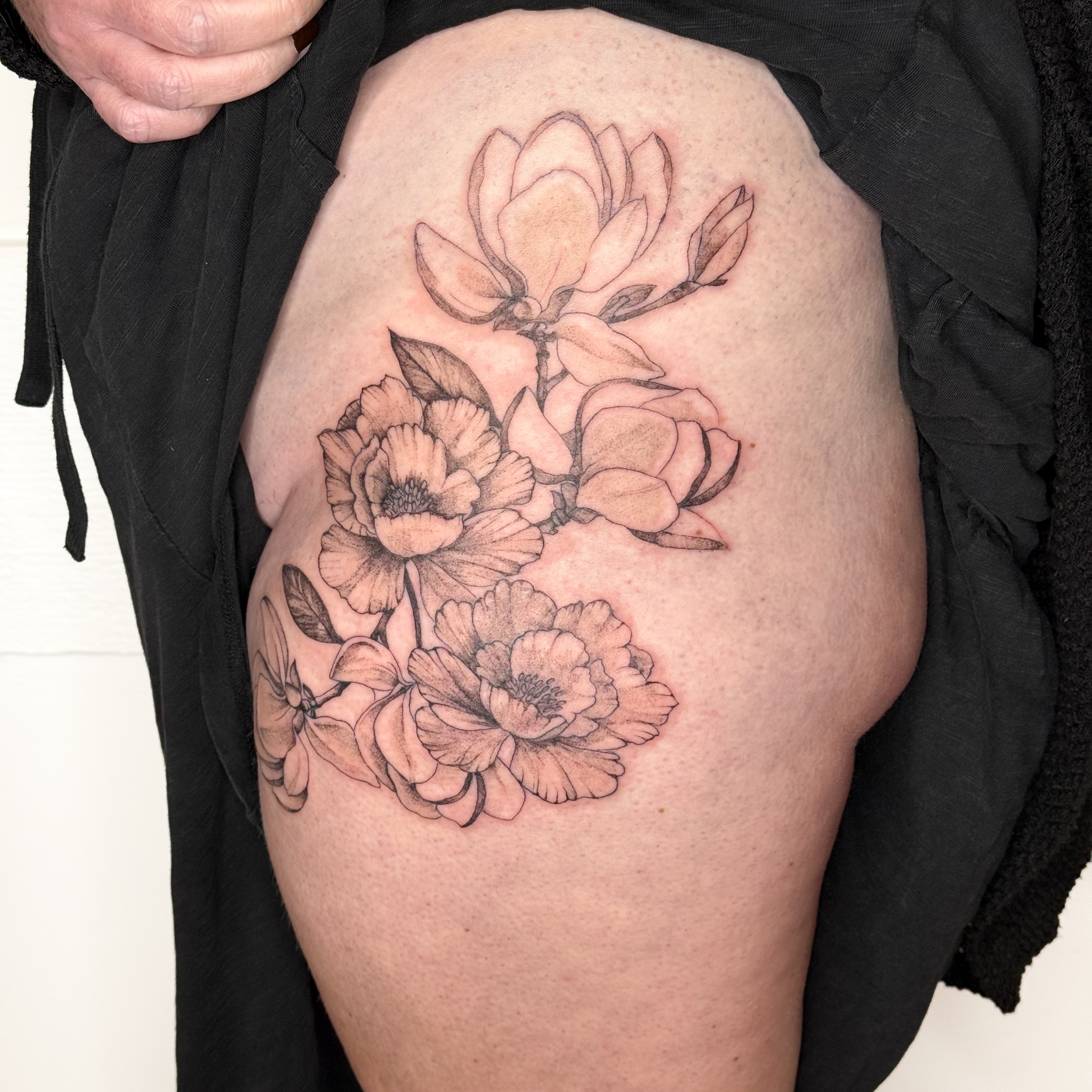 Flower bouquet black and grey tattoo on the thigh by ❁ Marlo Marquise Tattoo Artist ❁