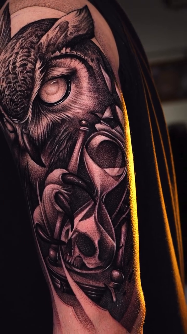 Owl and hourglass realism tattoo by Vicman Tattoo