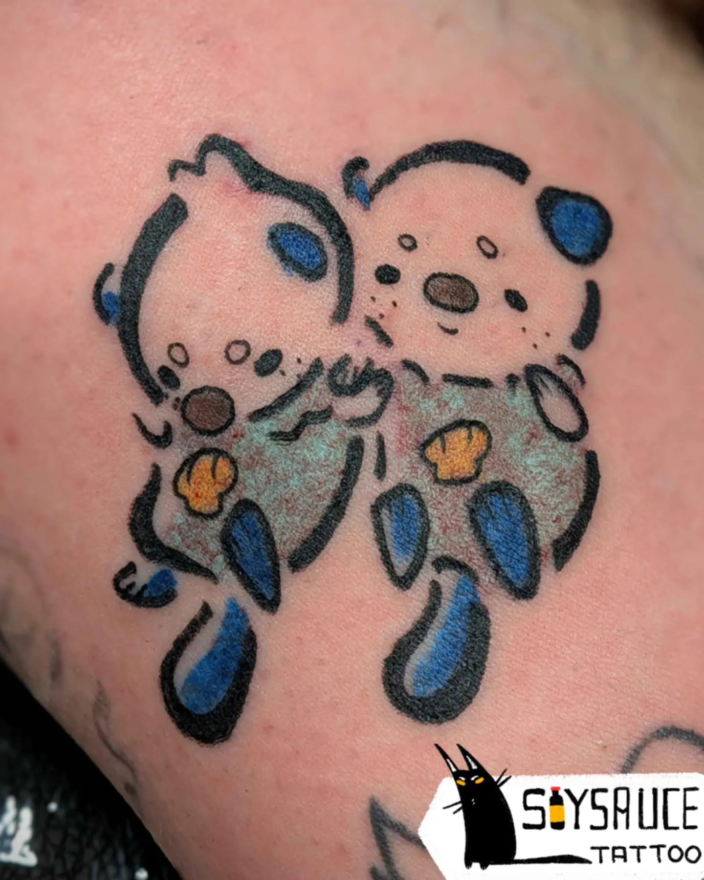 Two pandas dotwork tattoo on the thigh by Zoe Aucoin