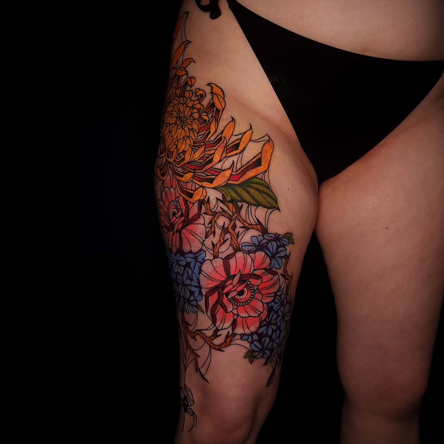 Floral arrangement new school tattoo on the thigh by Sheena Yu-Hsin Wood