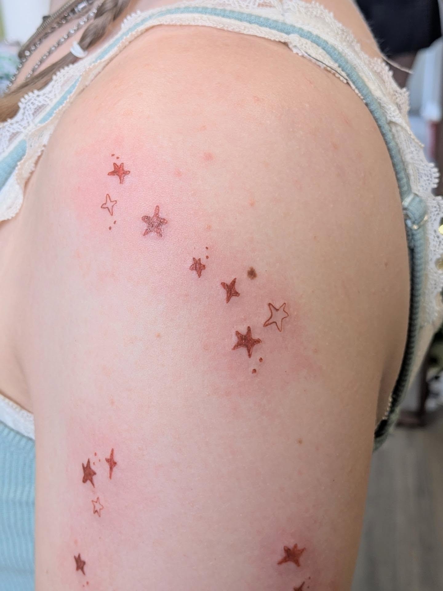 Stars dotwork tattoo on the shoulder by Ryan