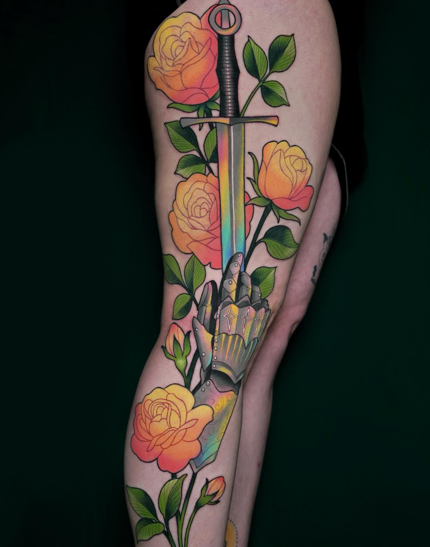 Sword and roses American traditional tattoo on the forearm by Brooke Borden
