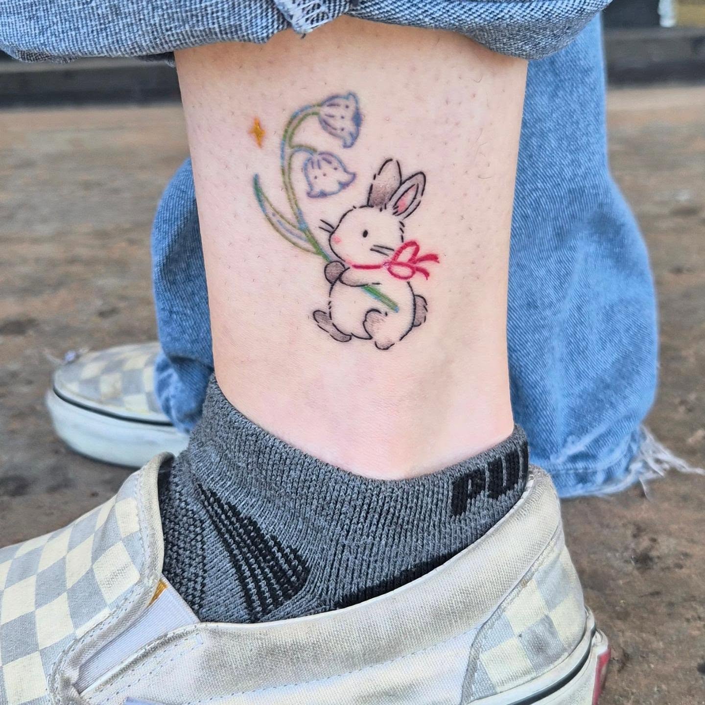 Rabbit and flowers dotwork tattoo by Cielle