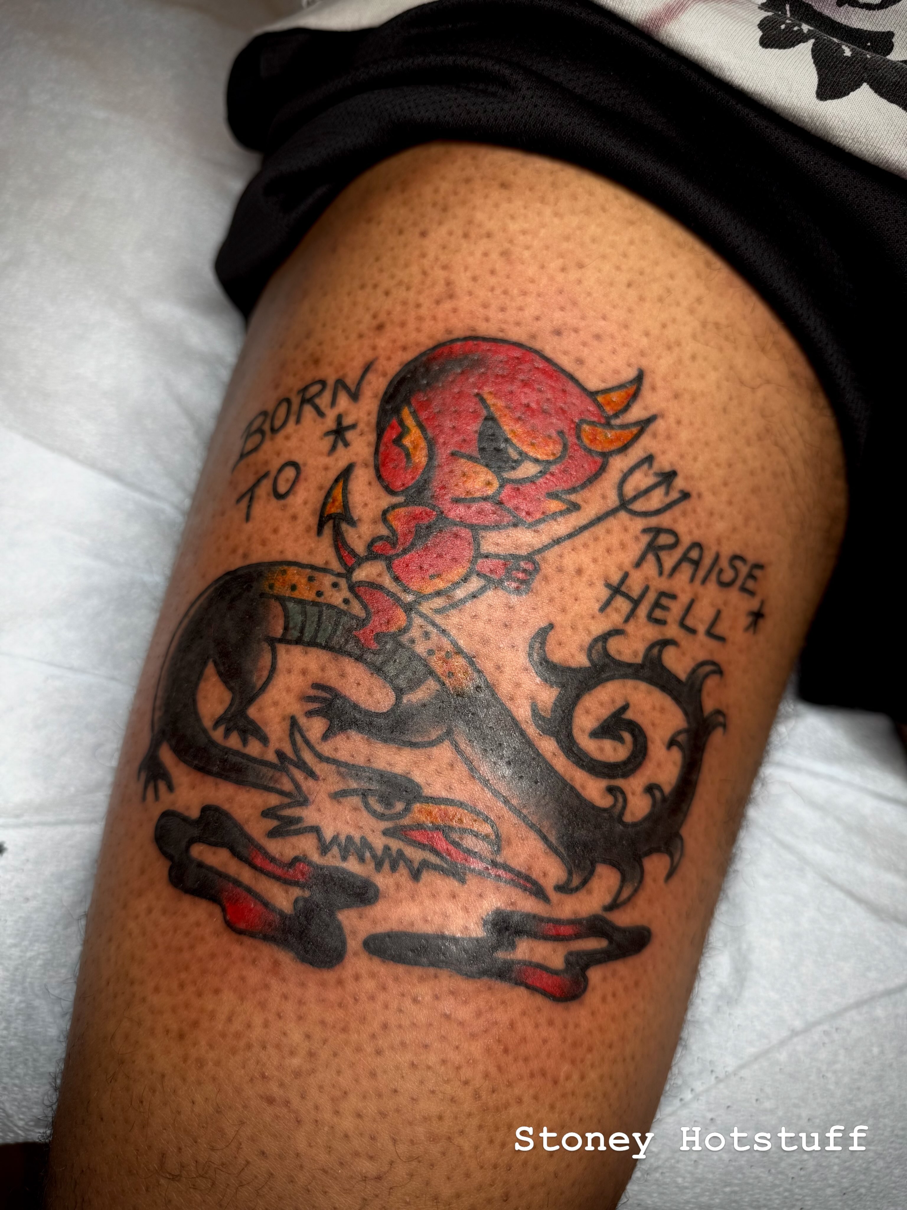 Red devil American traditional tattoo on the thigh by Victoria Lagano NYC Traditional Tattoos