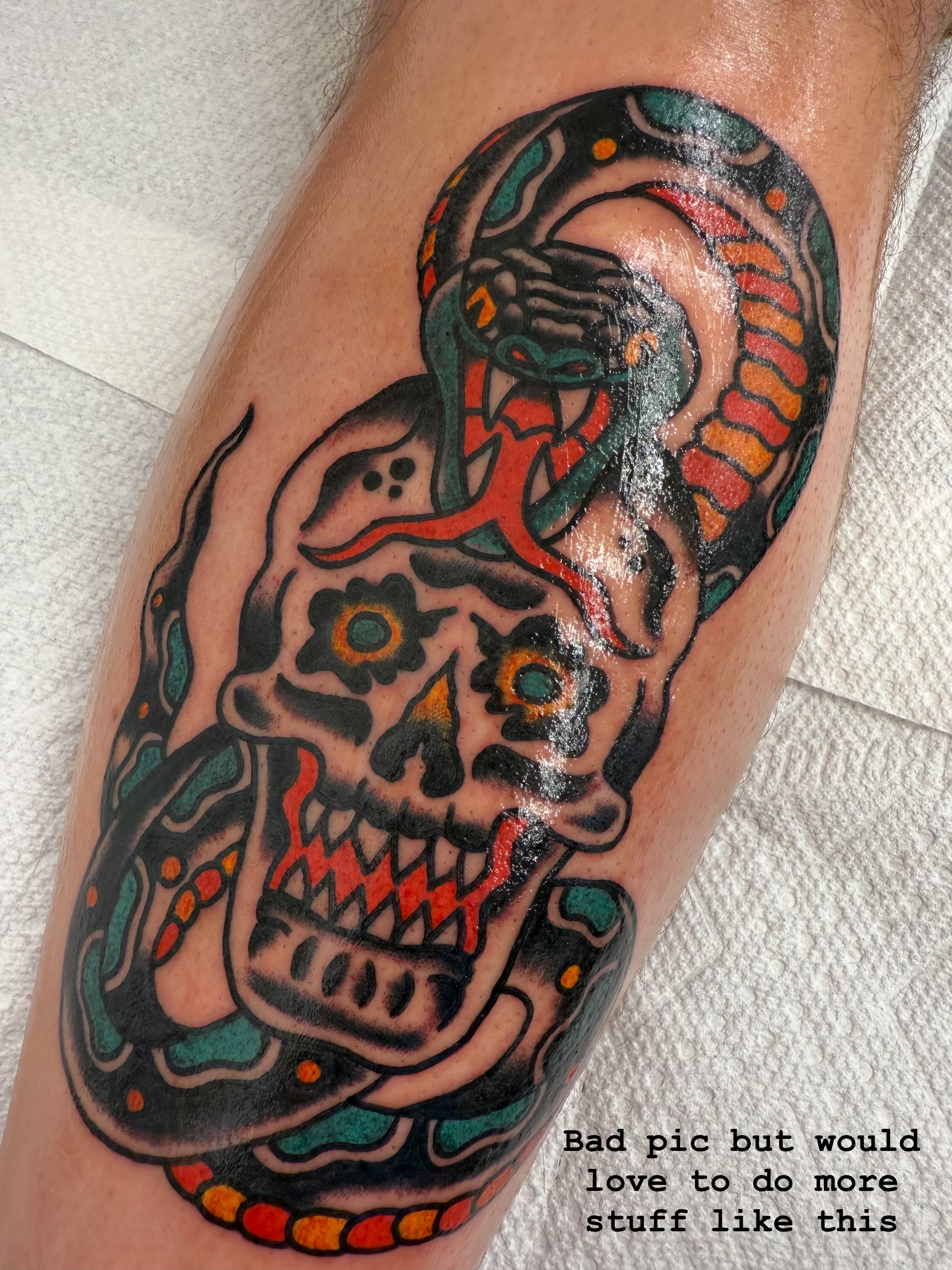 Sugar skull with snake American traditional tattoo on the leg by Victoria Lagano NYC Traditional Tattoos