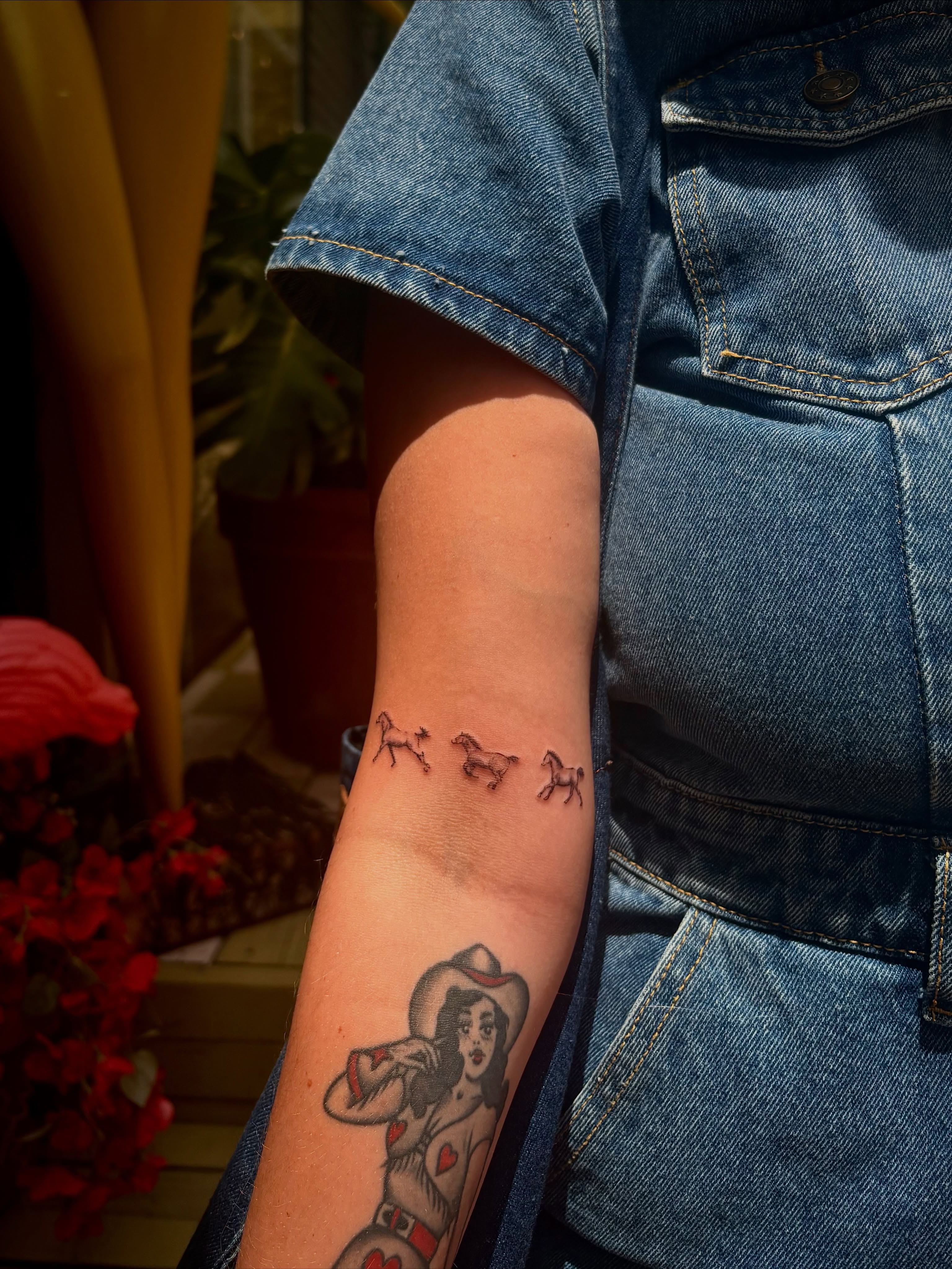 Horses American traditional tattoo on the forearm by @tattotos