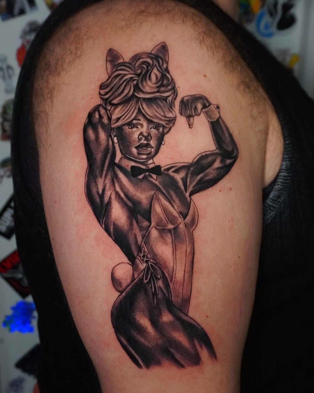 Strong woman flexing realism tattoo on the shoulder by hallow ☣︎ tattoo artist, Philadelphia, Pennsylvania