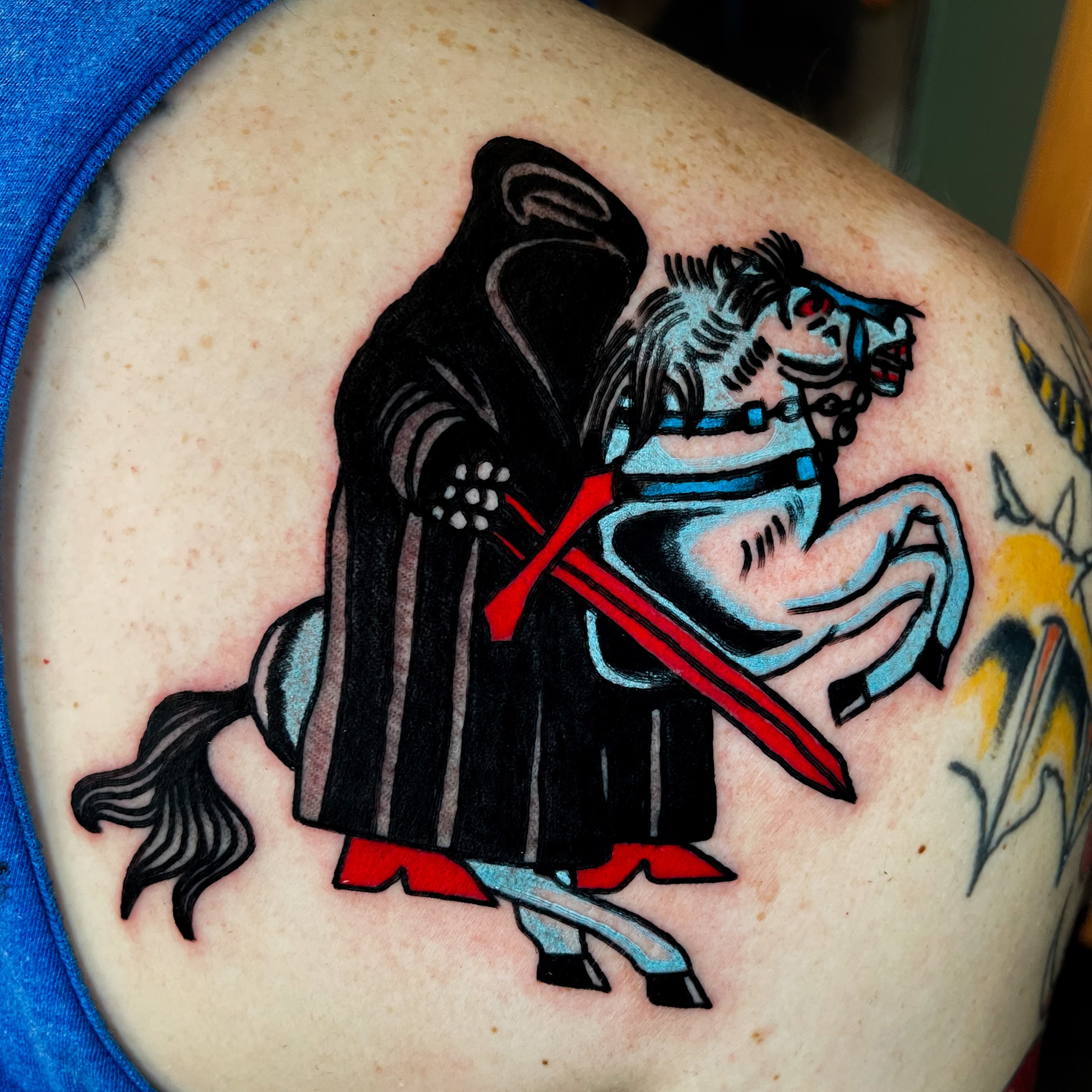 Dark knight on horseback American traditional tattoo on the shoulder by Devyn Hightower