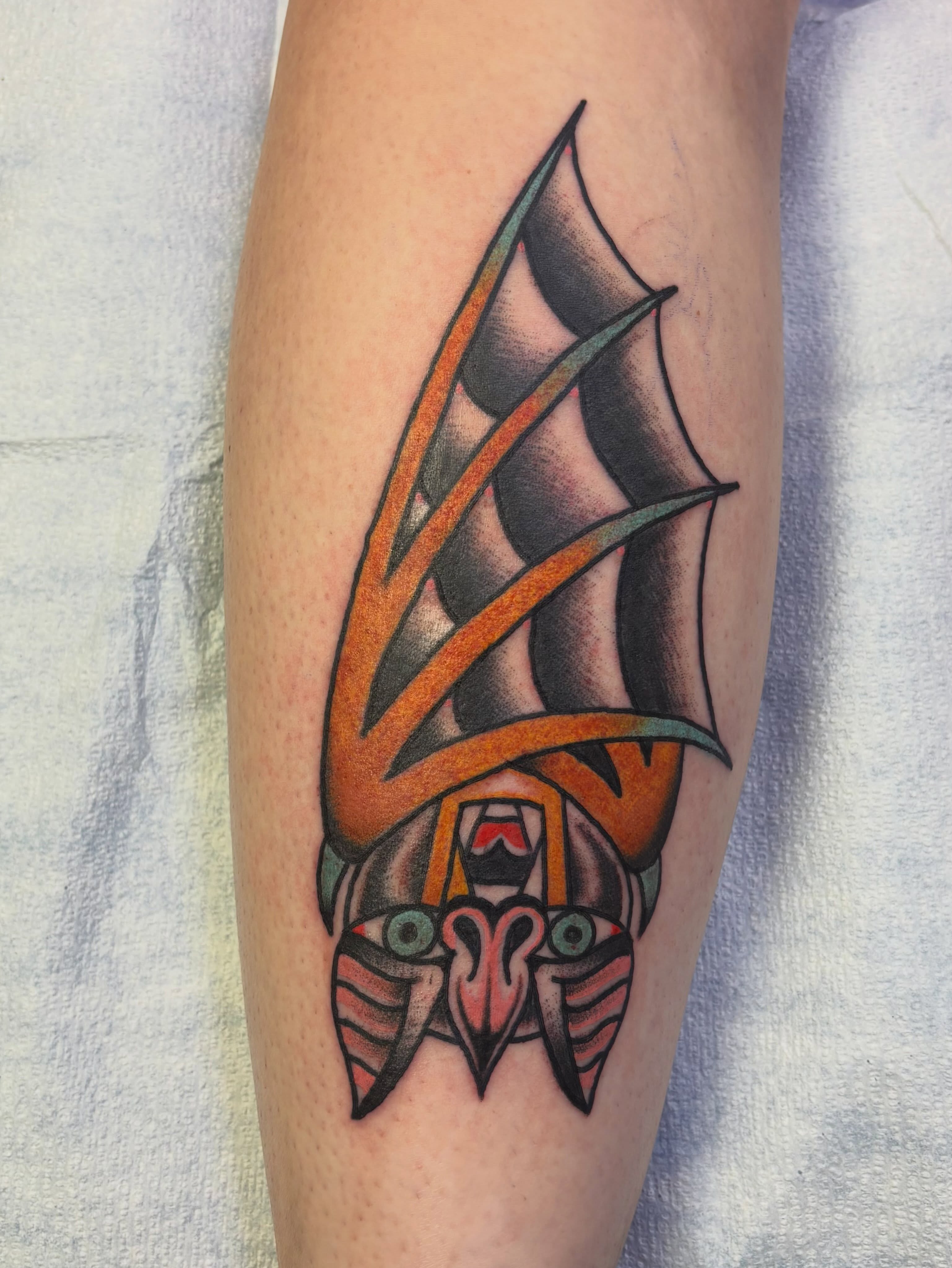 Owl American traditional tattoo on the forearm by Dave