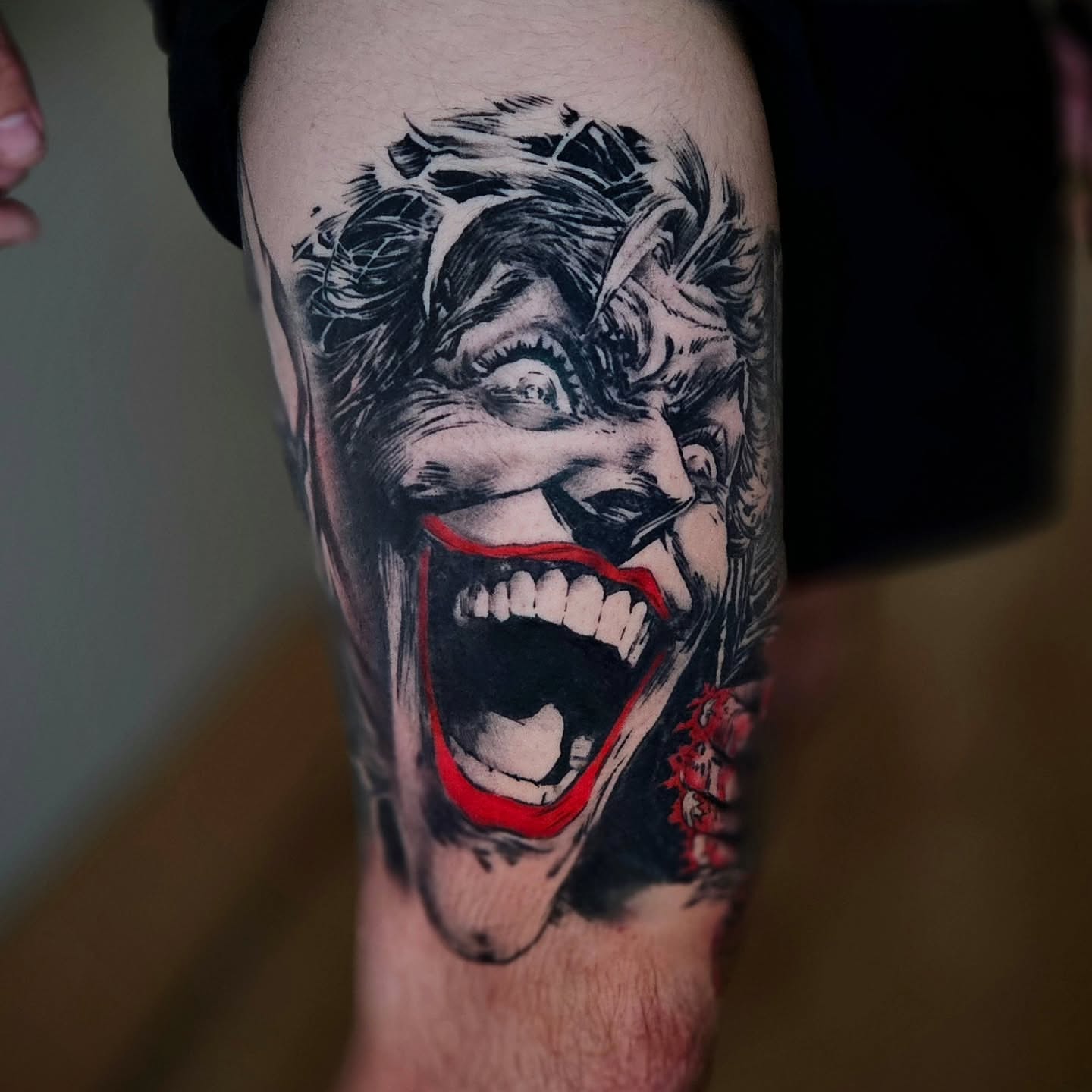 Joker realism tattoo on the forearm by Justin J-rust Smith