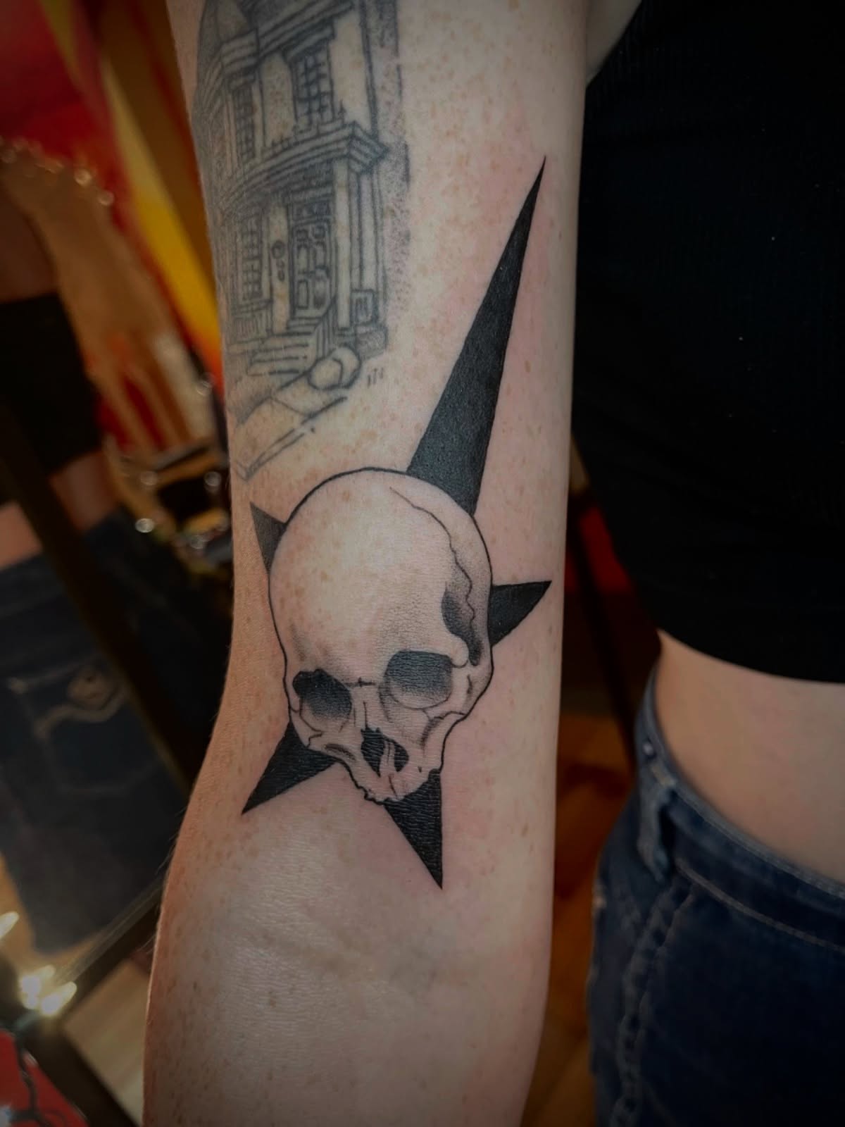 Skull black and grey tattoo on the forearm by Zoe Phan, Richmond, Virginia