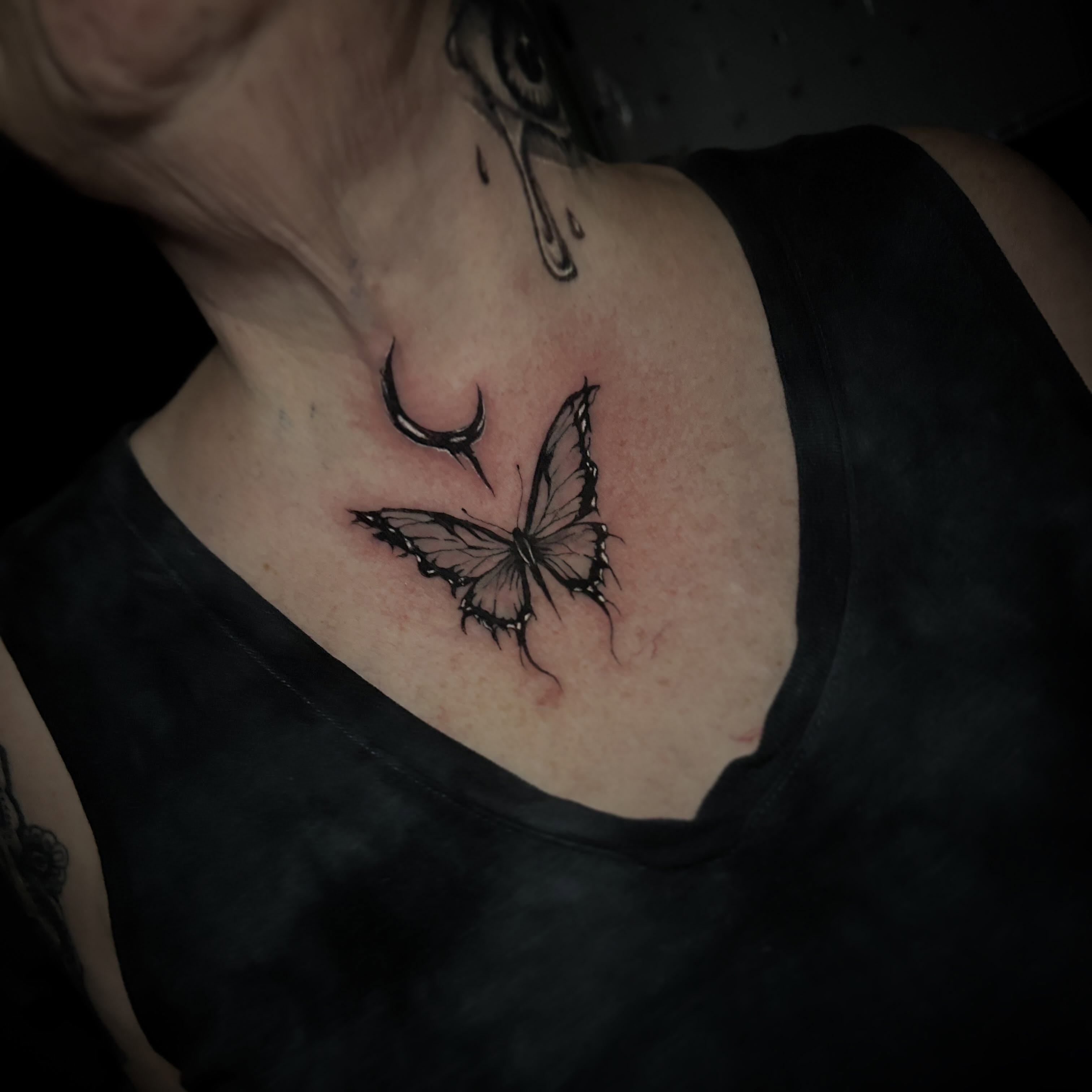 Butterfly black and grey tattoo on the chest by Marky