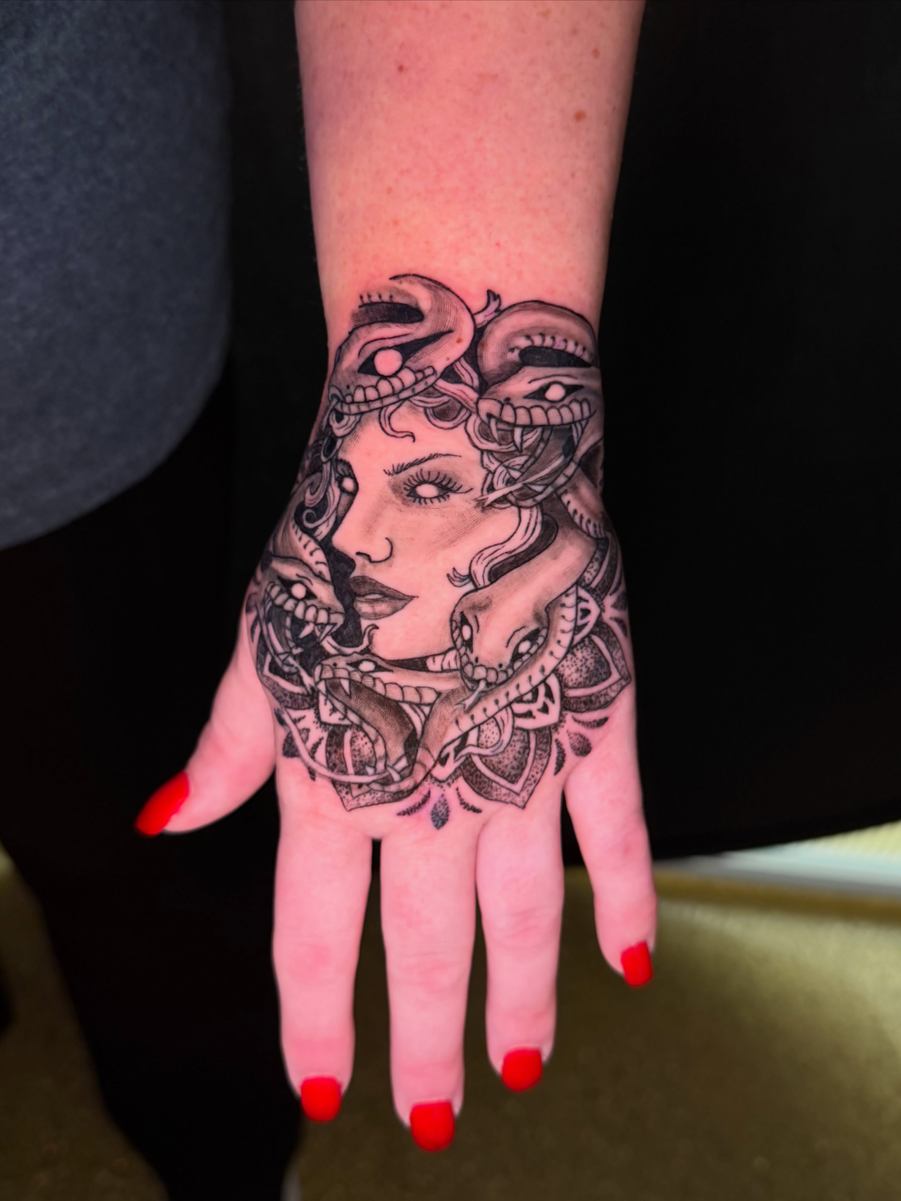 Medusa realism tattoo on the hand by Abbie Kaitlynn Taylor, Dayton, Ohio