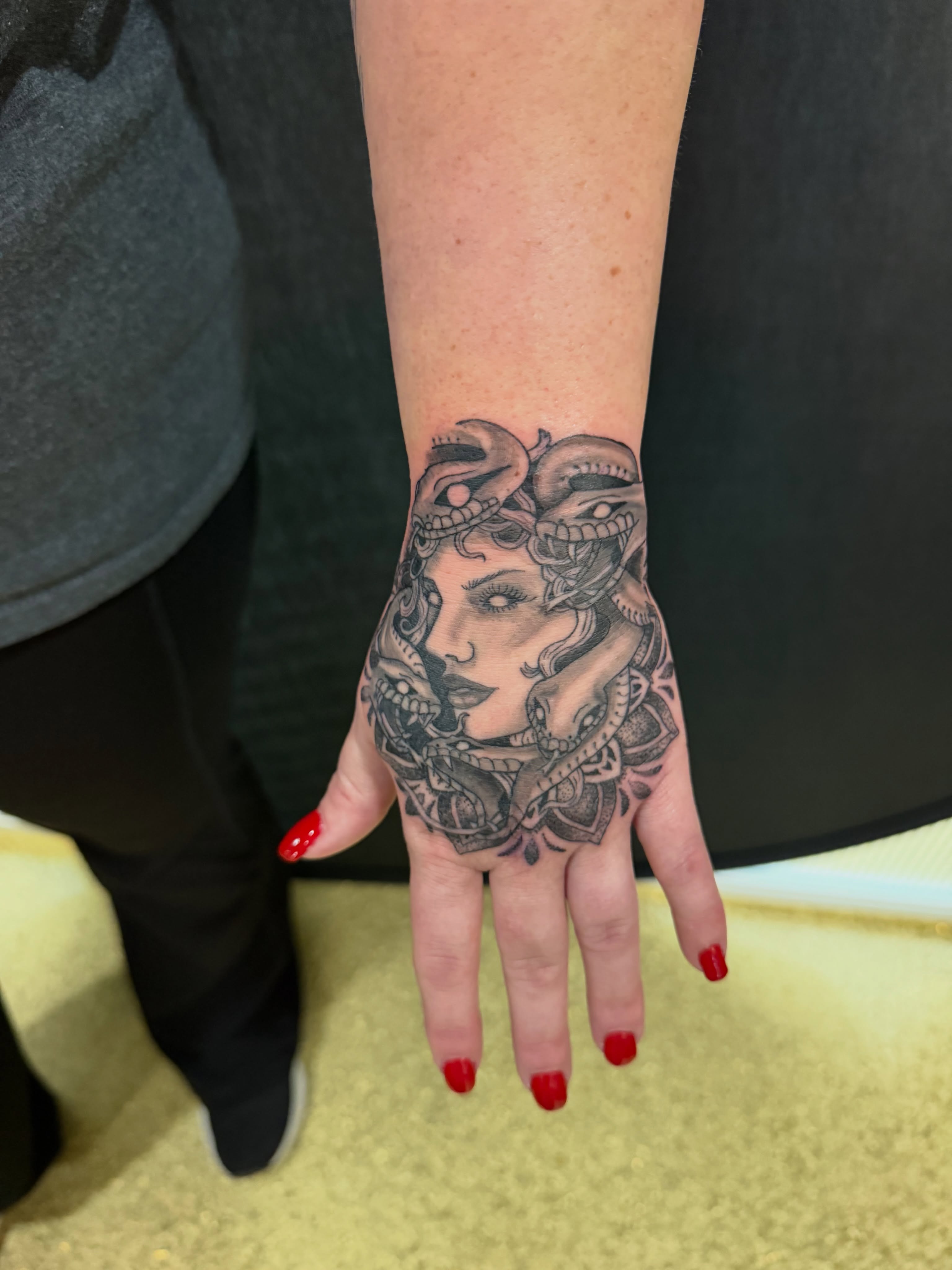 Medusa realism tattoo on the hand by Abbie Kaitlynn Taylor, Dayton, Ohio