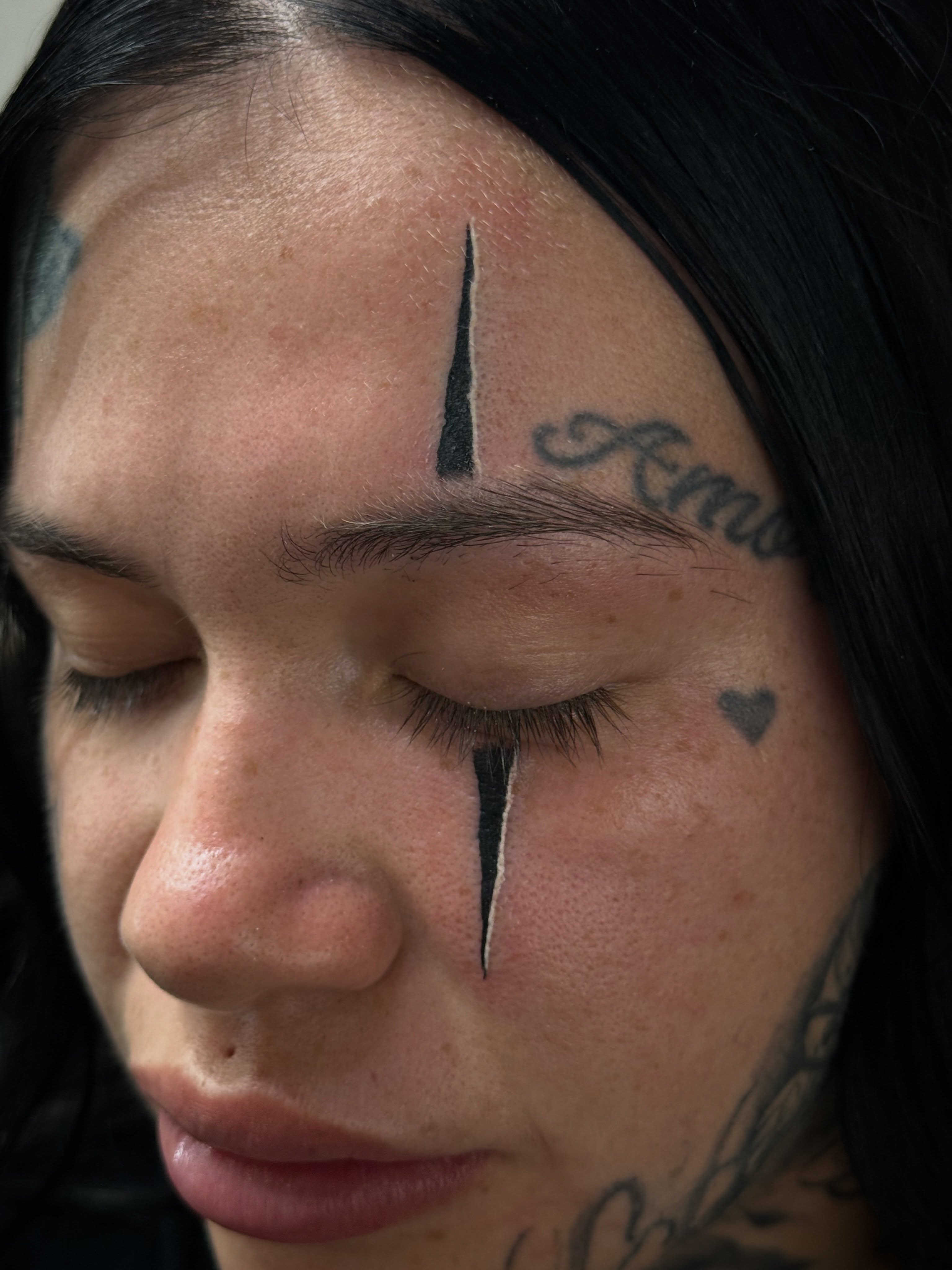 Tear drop black and grey tattoo on the head by @samg_tat2s, San Diego, California