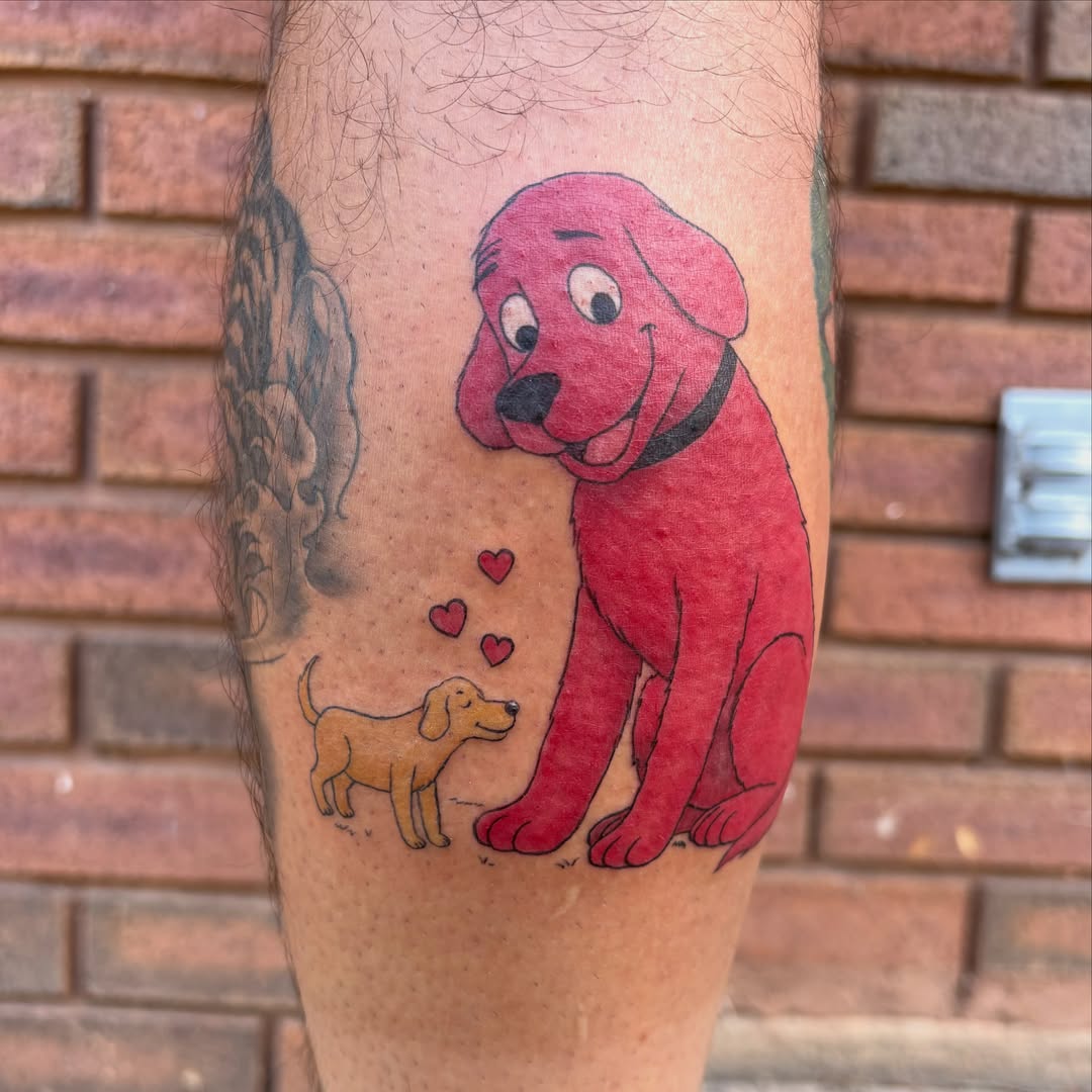 Clifford the Big Red Dog illustrative tattoo on the forearm by Sierra Maynard