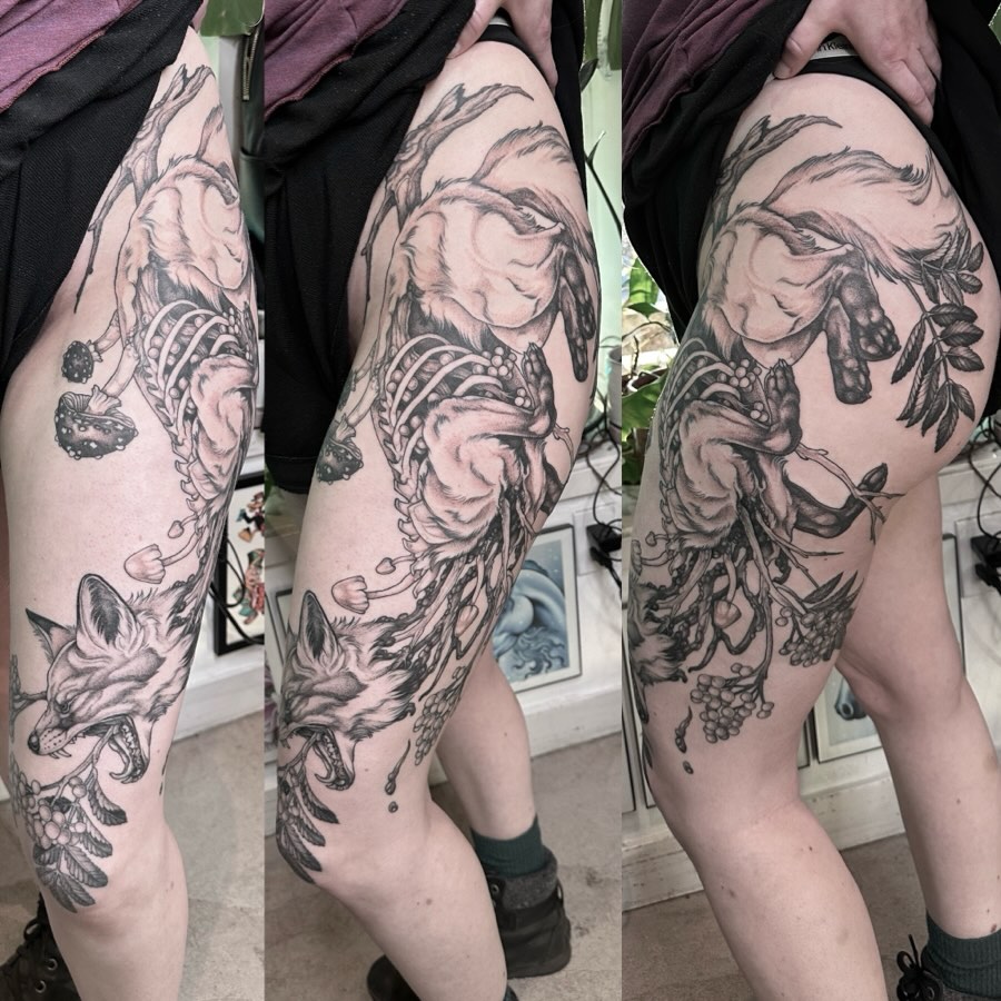 Fox and flora realism tattoo on the thigh by Cassidy Depew, Seattle, Washington