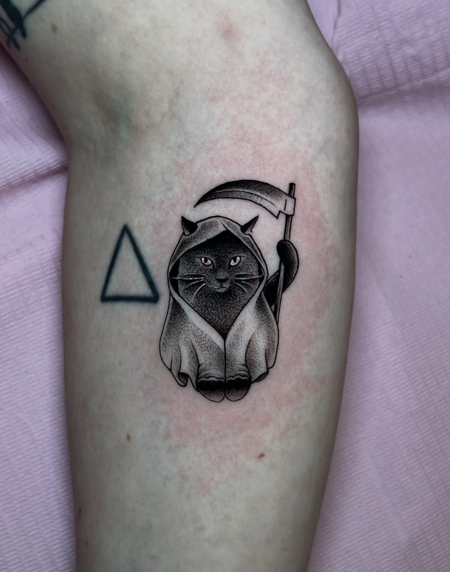 Cat with scythe dotwork tattoo on the forearm by Tehnaya