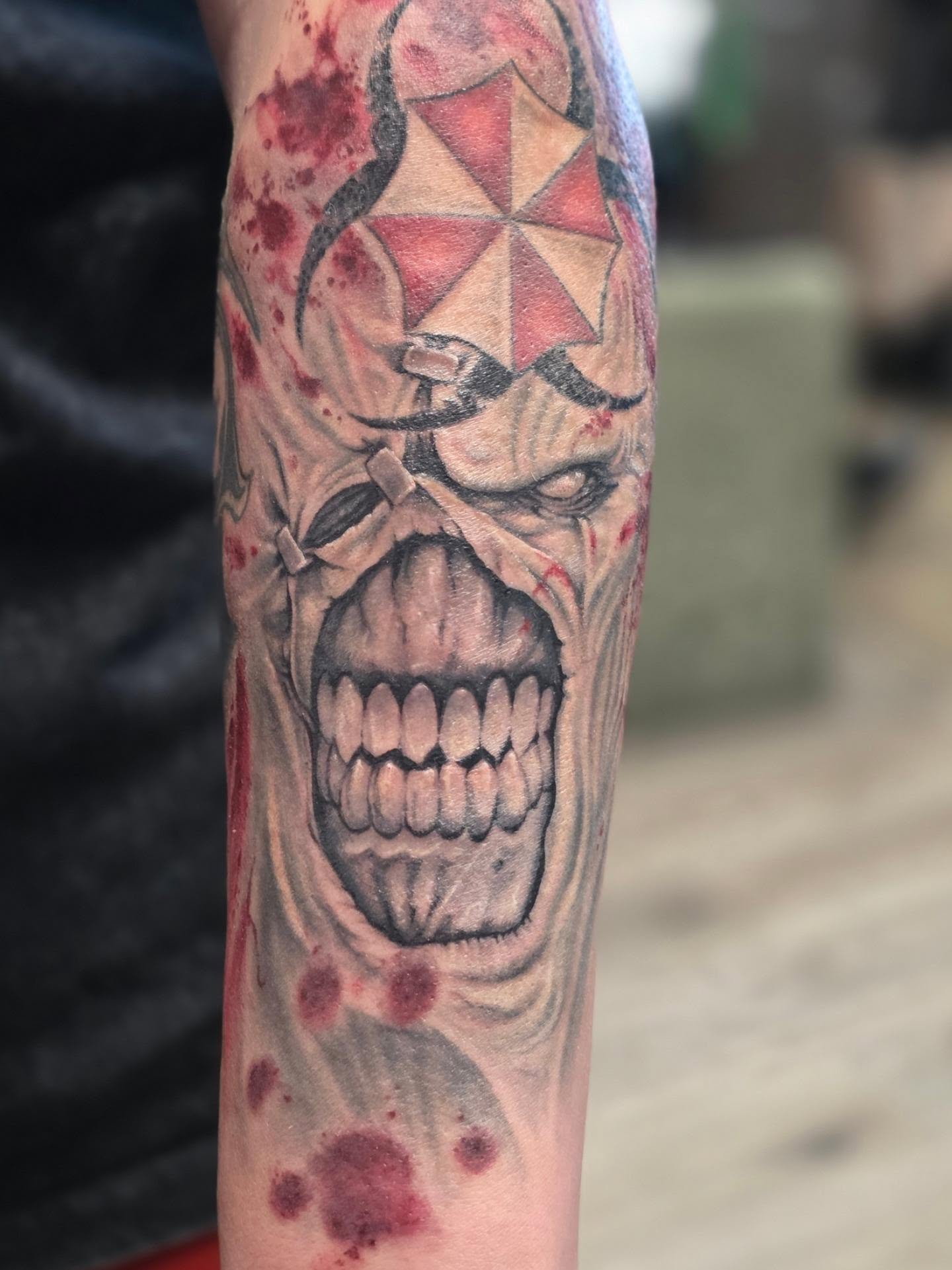 Resident evil skull realism tattoo on the forearm by Martin Colonna