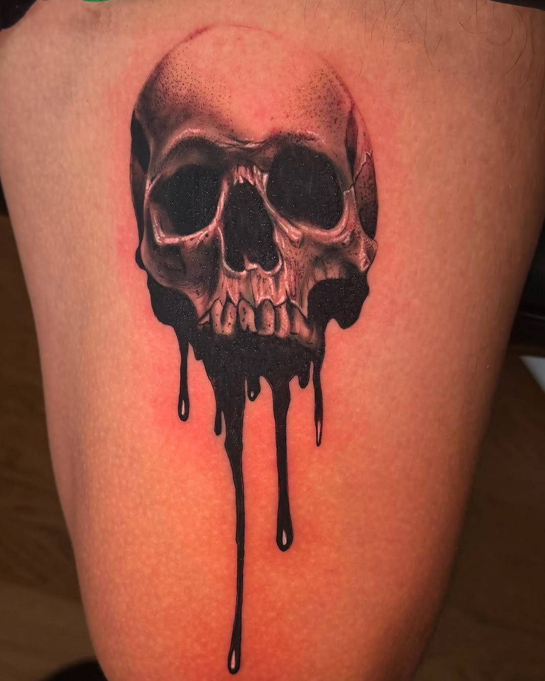 Melting skull dotwork tattoo on the thigh by Juan pablo, Toronto, Ontario