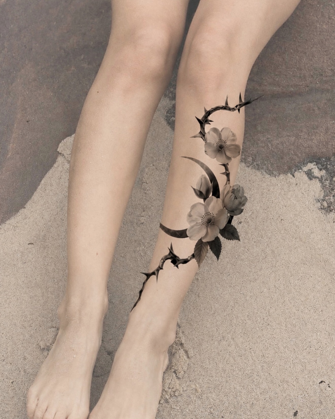Flowers and thorns realism tattoo on the calf by Xin Huang
