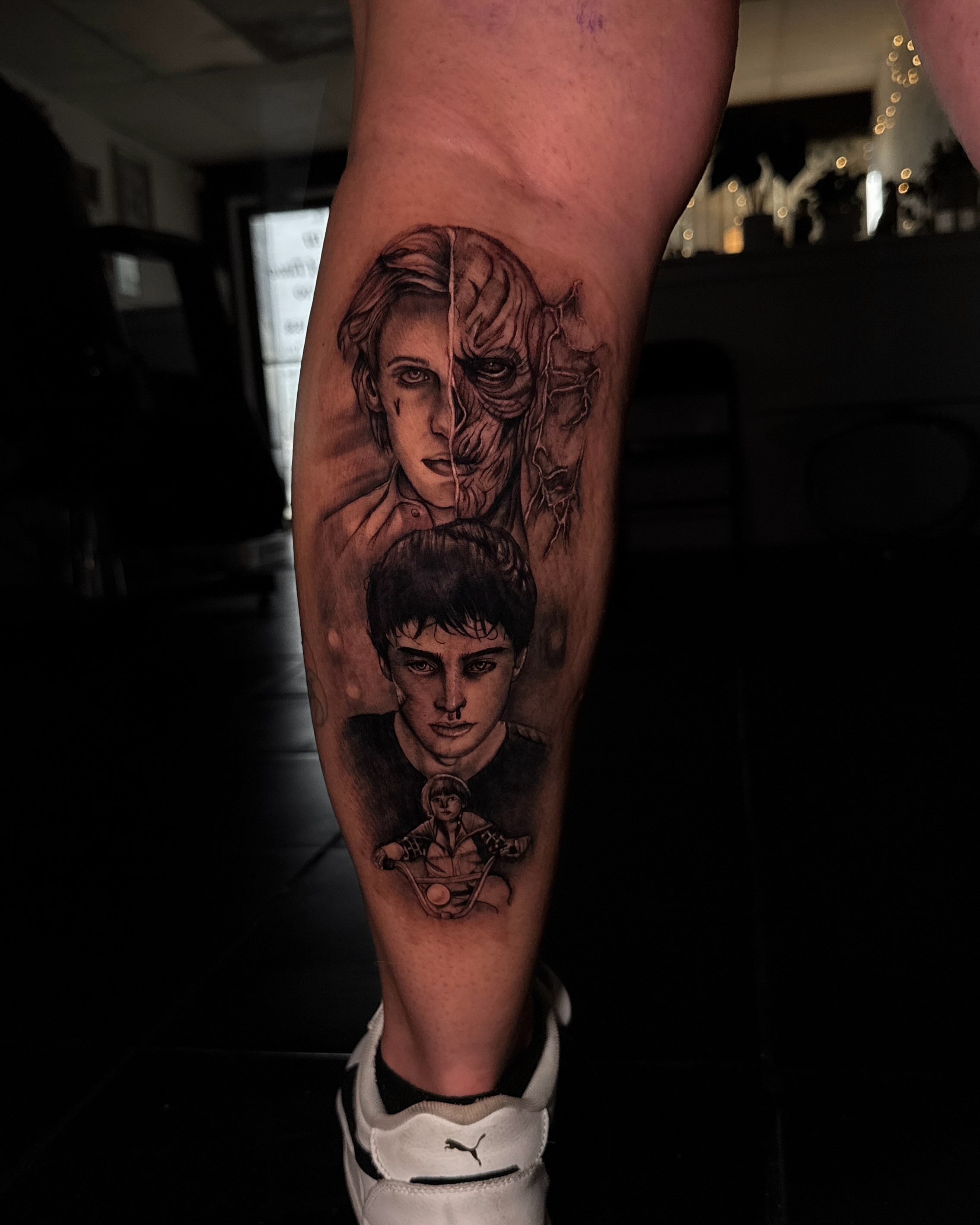 Two faces realism tattoo on the forearm by Rachel