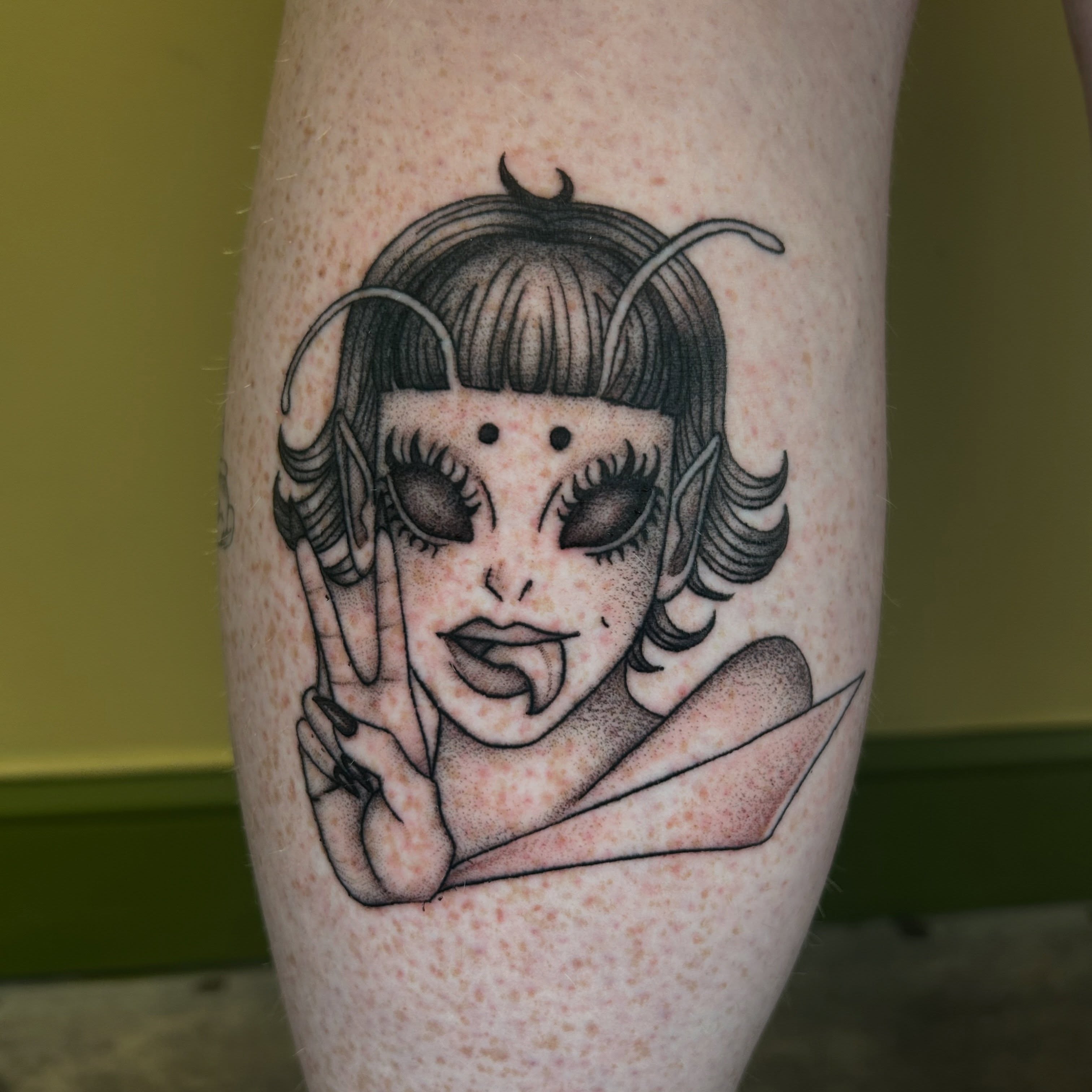 Alien girl dotwork tattoo on the forearm by Cassy D, Miami, Florida