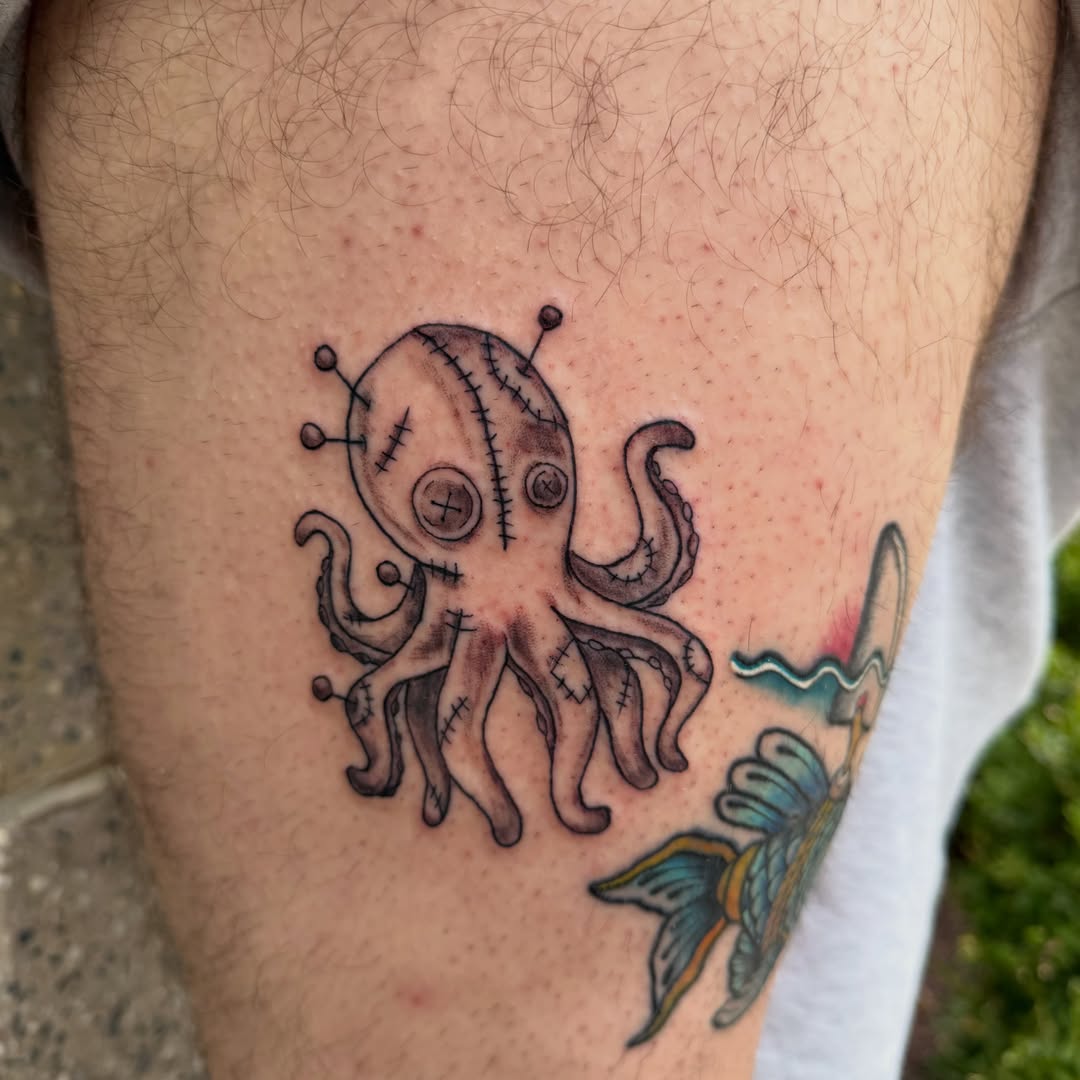 Octopus American traditional tattoo on the thigh by K. Bel Art