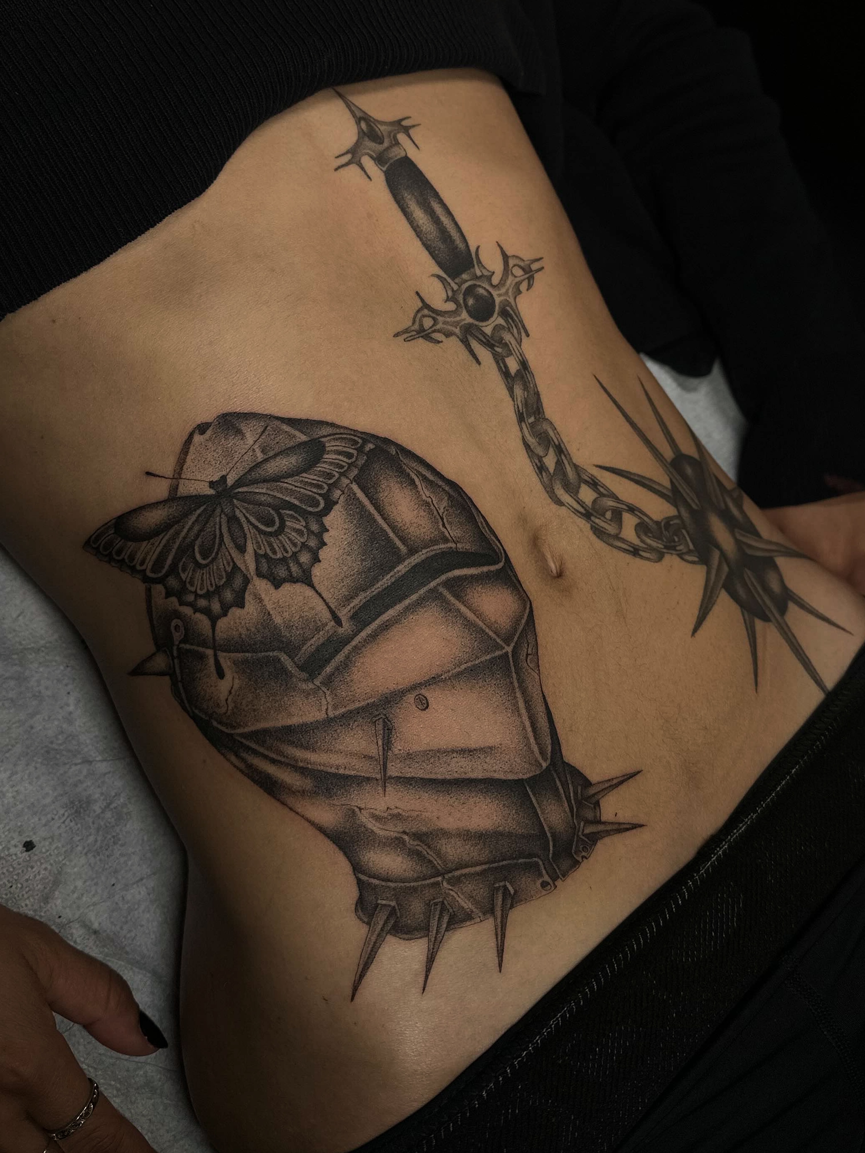 Ship and butterfly realism tattoo on the ribs by 𝖍𝖆𝖓𝖓𝖆𝖍