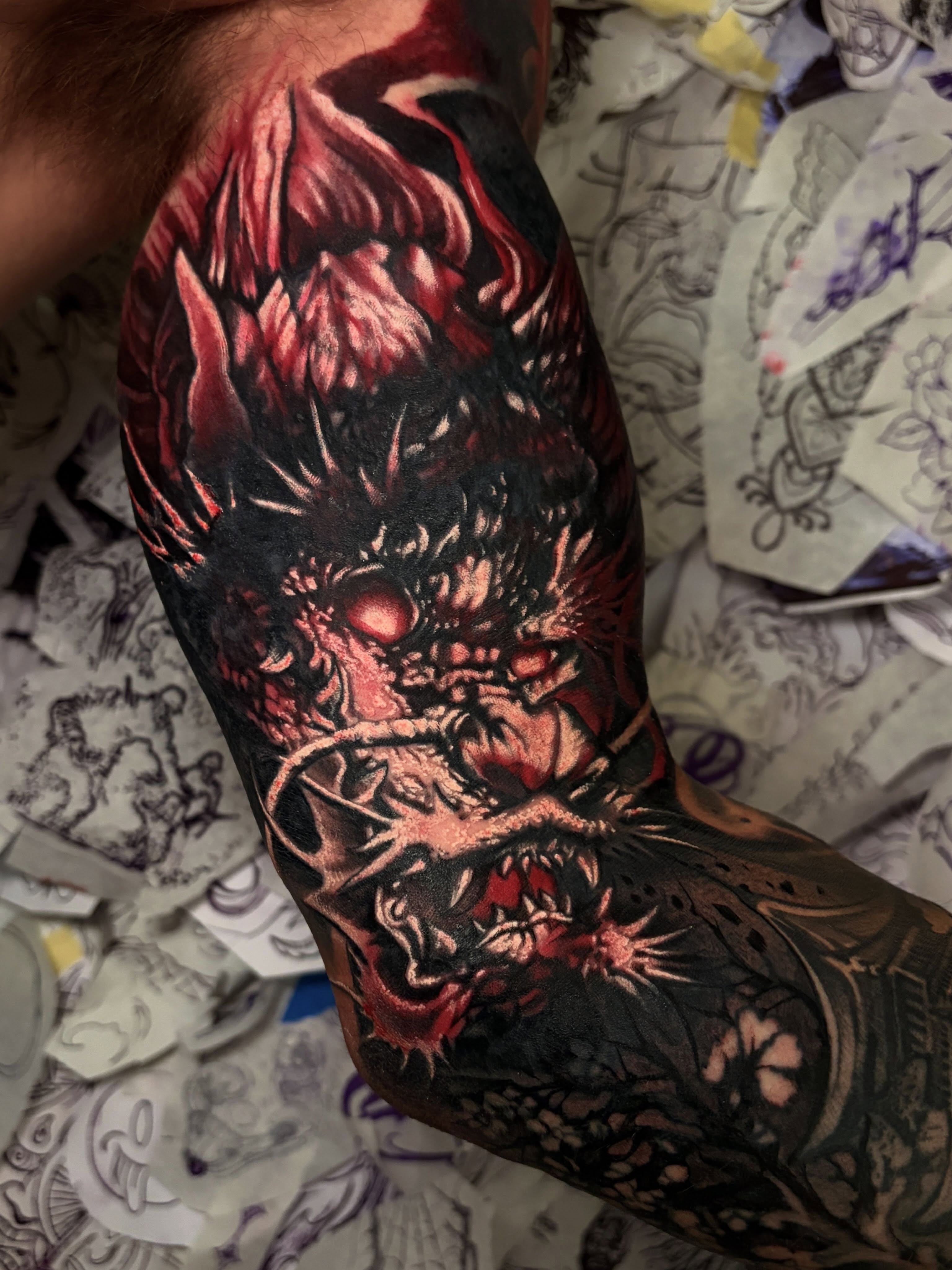 Demon dark realism tattoo on the forearm by Italo Holie