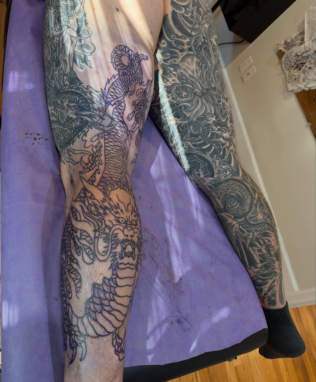 Dragon japanese irezumi tattoo on the upper arm by Laura Saadati Kepper