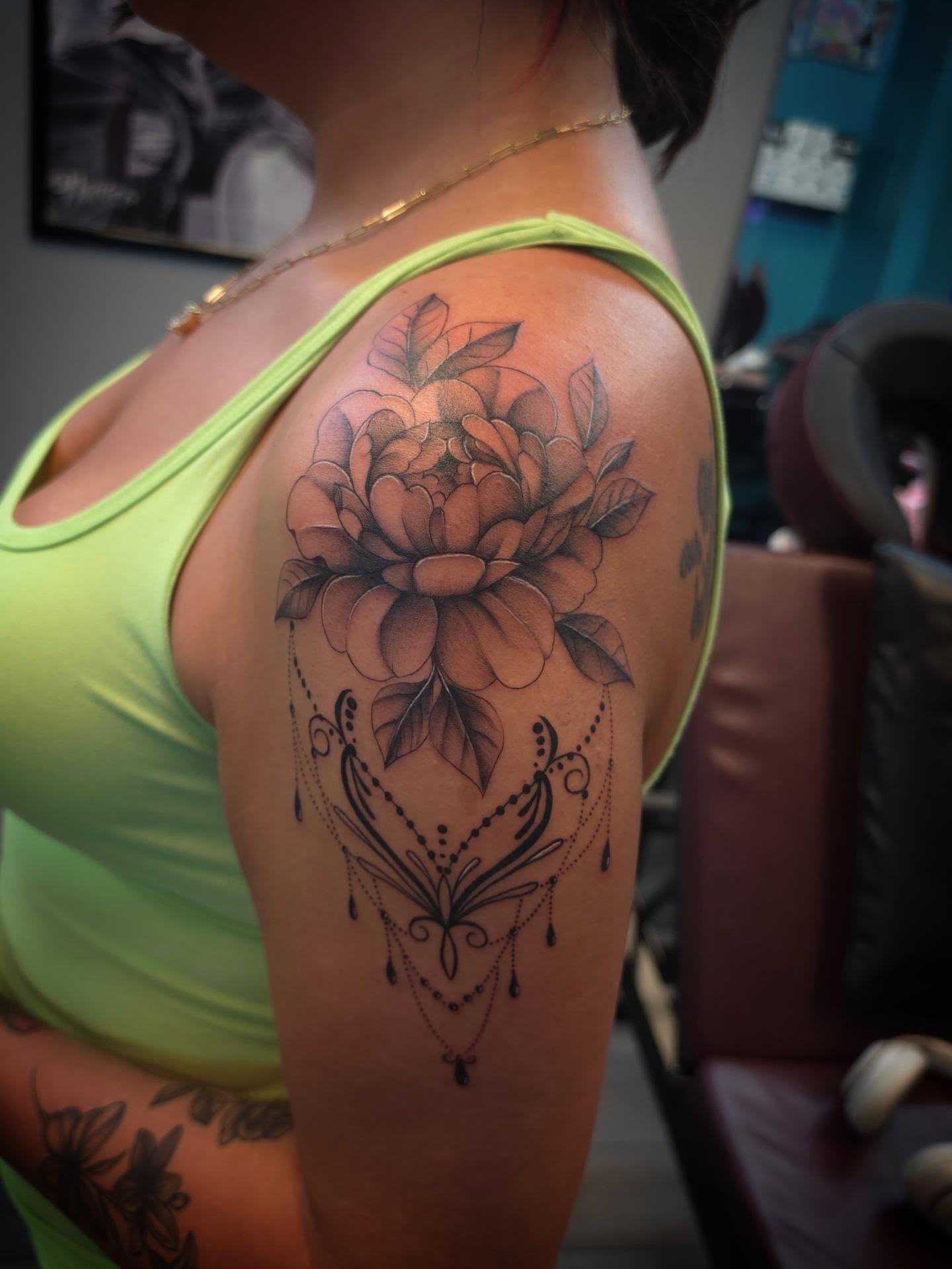 Peony black and grey tattoo on the shoulder by Danielle Elizabeth