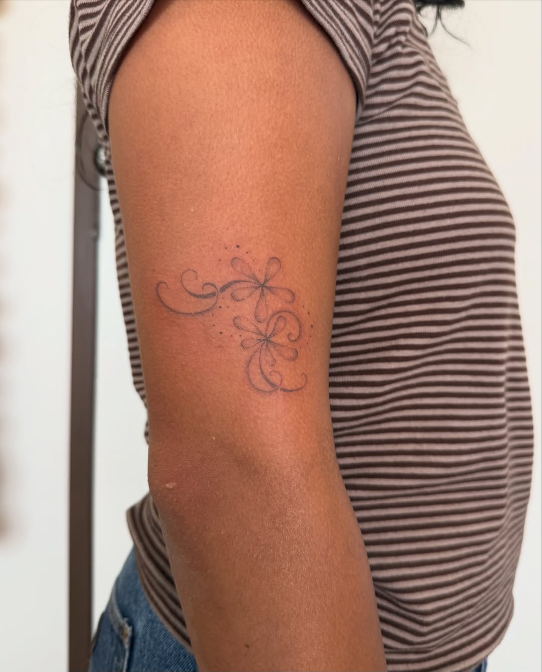 Floral design dotwork tattoo on the forearm by Soomin