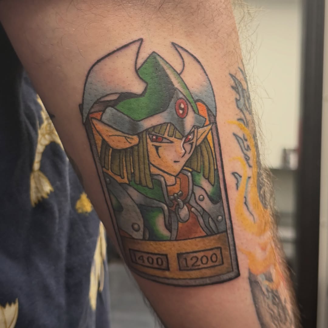 Link anime tattoo on the forearm by Katie Rojas