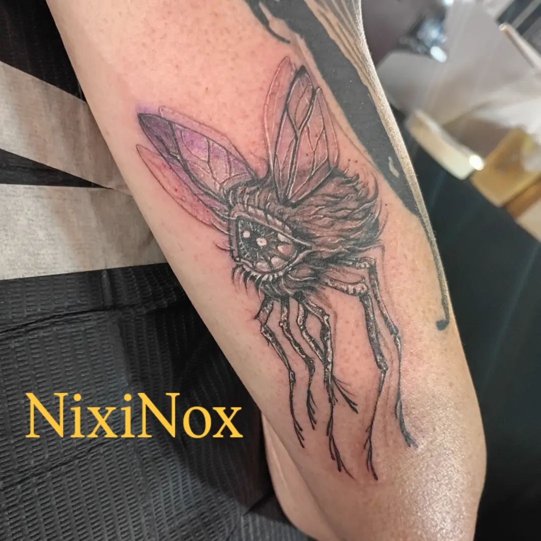 Insect dotwork tattoo on the forearm by Niki Jackson