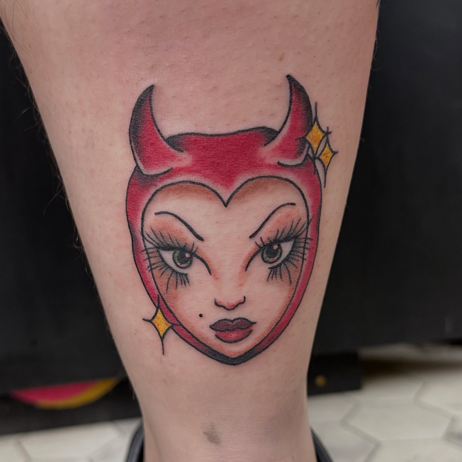 Devil girl new school tattoo on the forearm by Nicki Hoverson