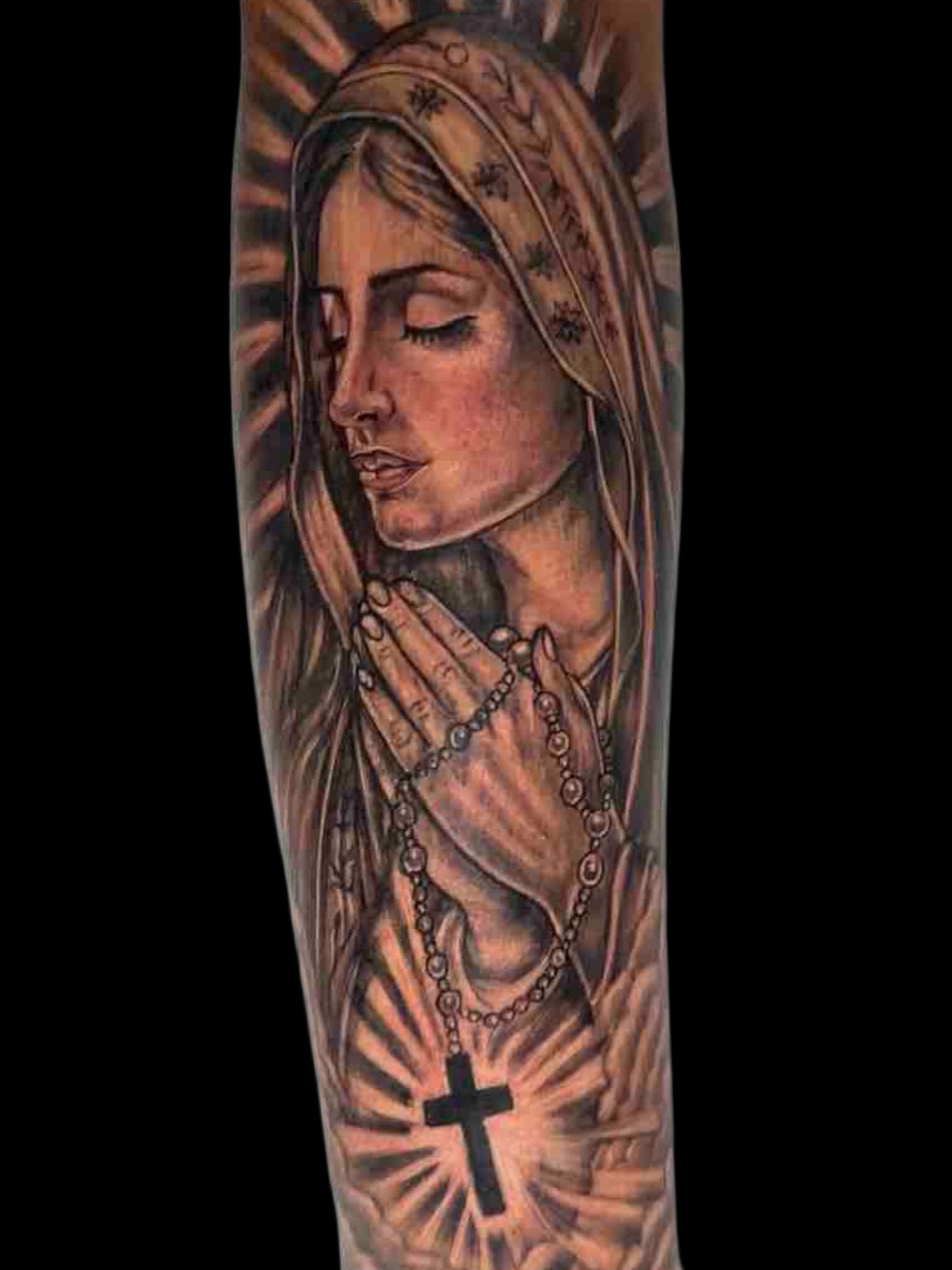 Praying woman realism tattoo on the forearm by Junior Sanchez Dfw