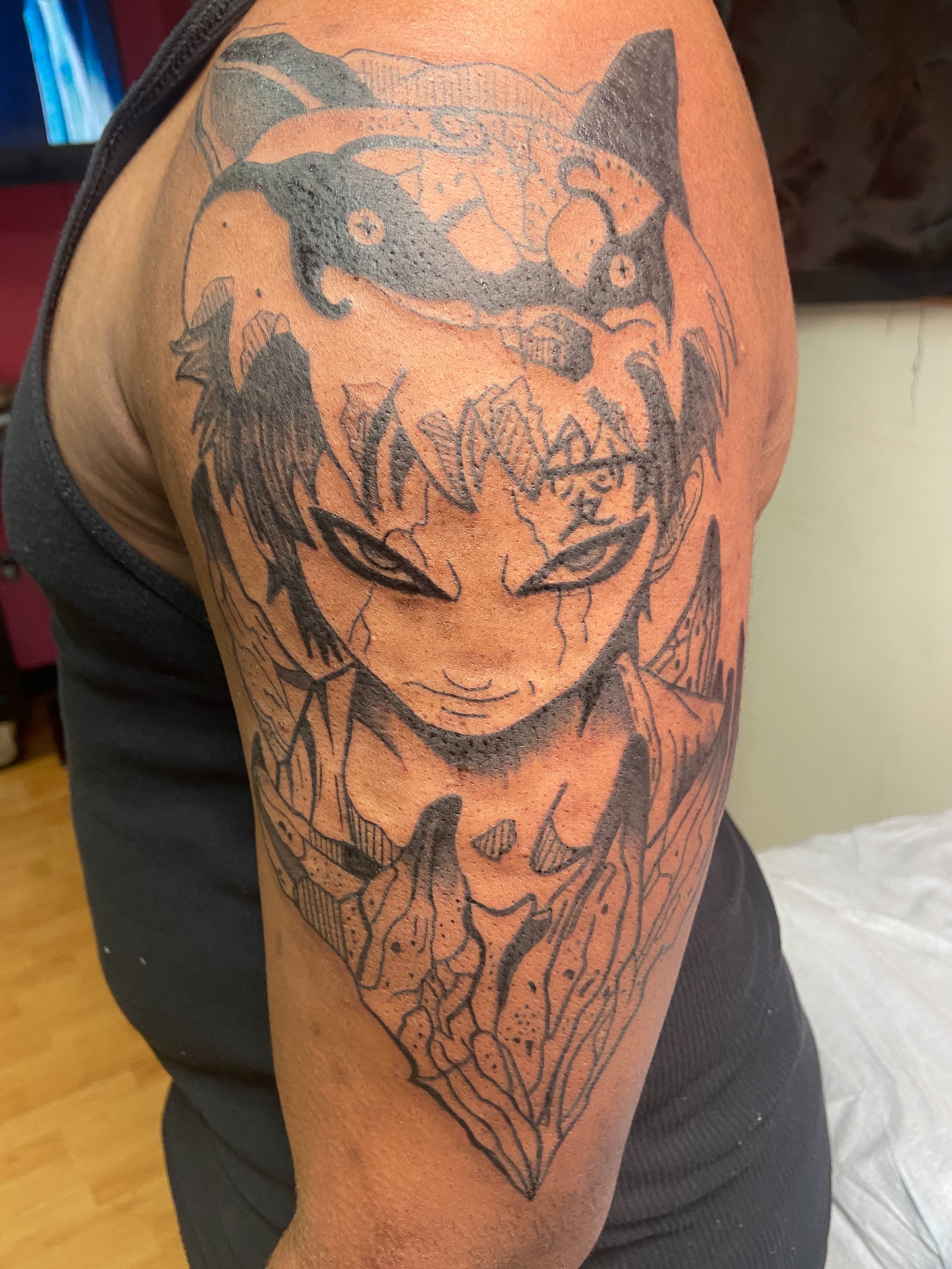 Anime character anime tattoo on the upper arm by ~KR¥$~