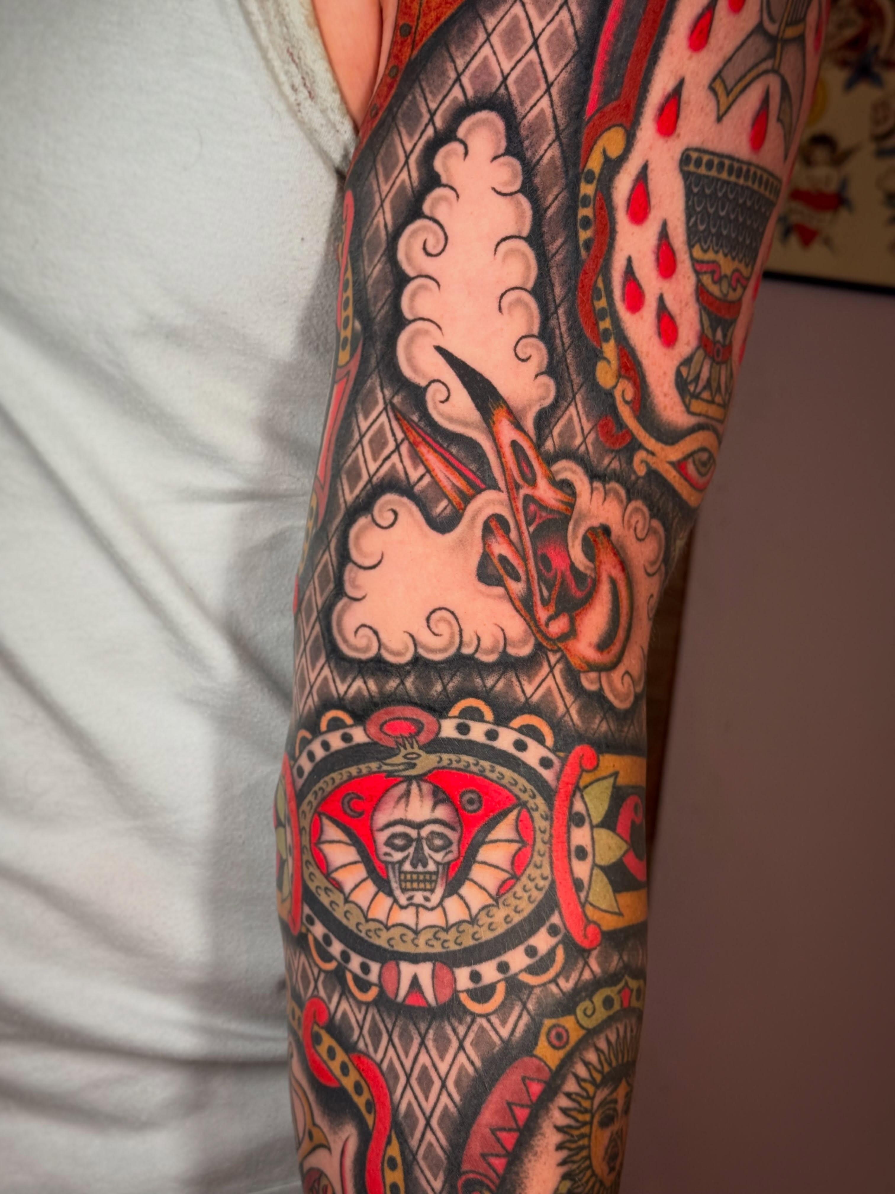 Japanese irezumi American traditional tattoo on the forearm by Collin Rigsby, Minneapolis, Minnesota